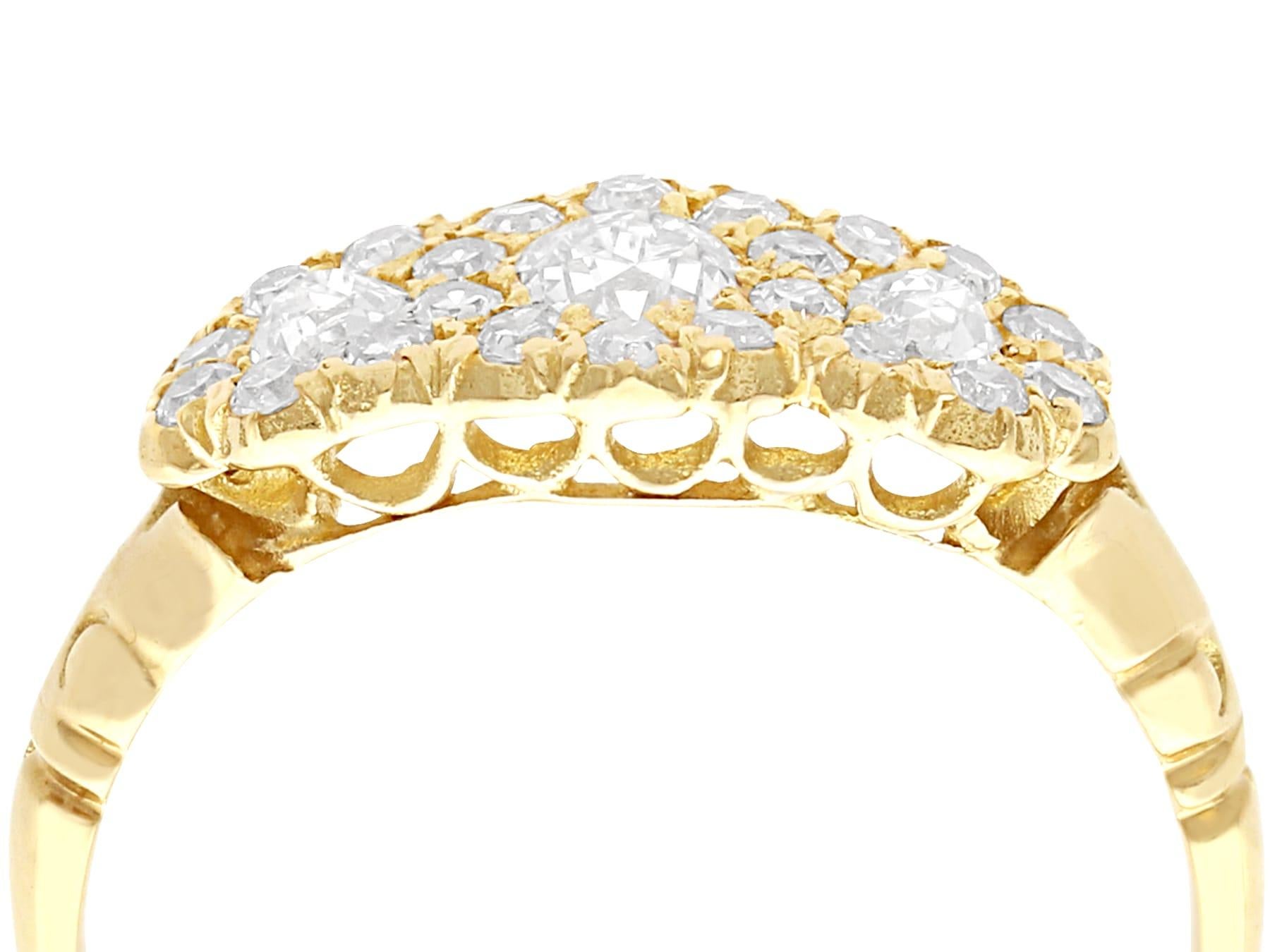 A fine and impressive antique 1.01 carat diamond and 18 karat yellow gold trilogy cluster ring; part of our diverse diamond cocktail ring collections.

This impressive antique diamond ring has been crafted in 18k yellow gold.

The pierced decorated