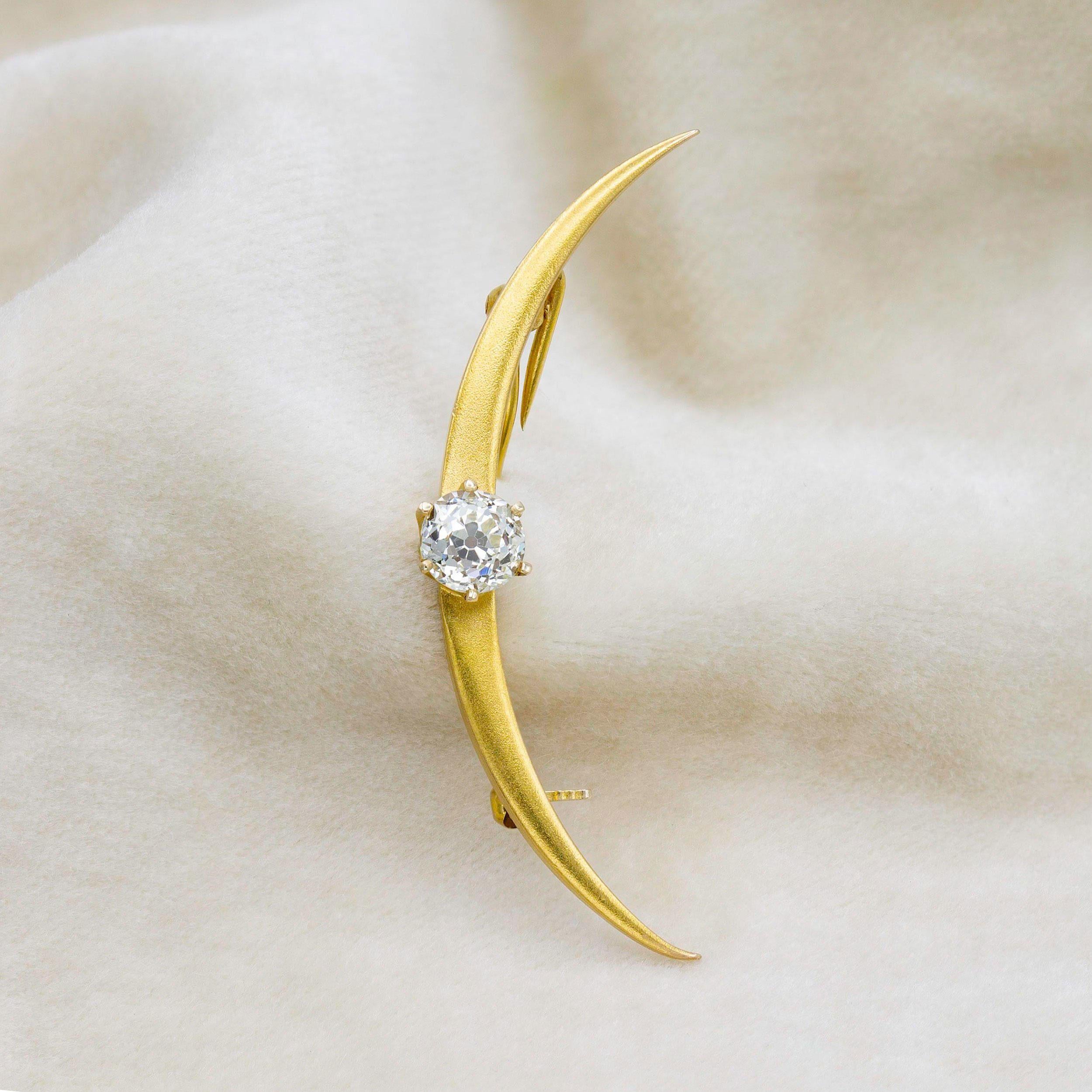 You heard it here first, brooches are back. This unique 18kt swooping crescent is centered by a chunky 1 carat GIA certified Old European cut diamond. It would make a super chic addition to any outfit.

Diamond Details

Primary Stone: 1.01 ct. Old