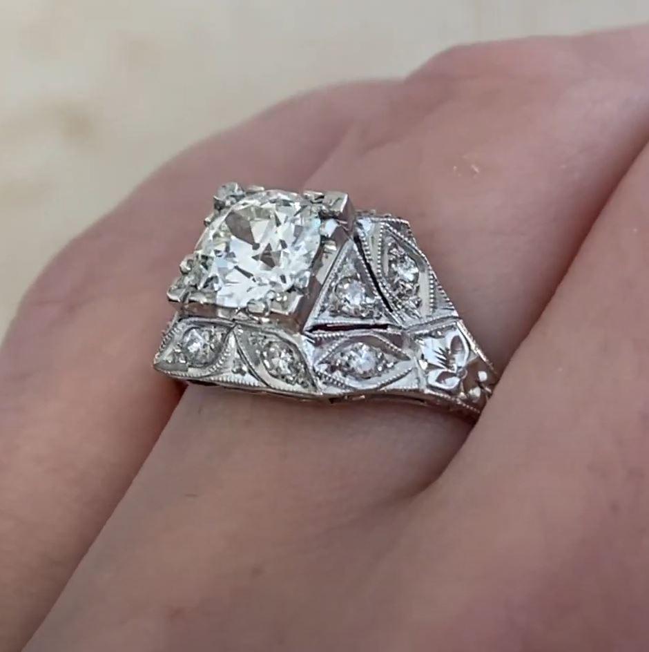 This exquisite Art Deco engagement ring features a stunning, prong-set old European cut diamond at its center, weighing approx. 1.00-carats. With J color and VS1 clarity, the diamond radiates timeless elegance and brilliance, a true testament to the