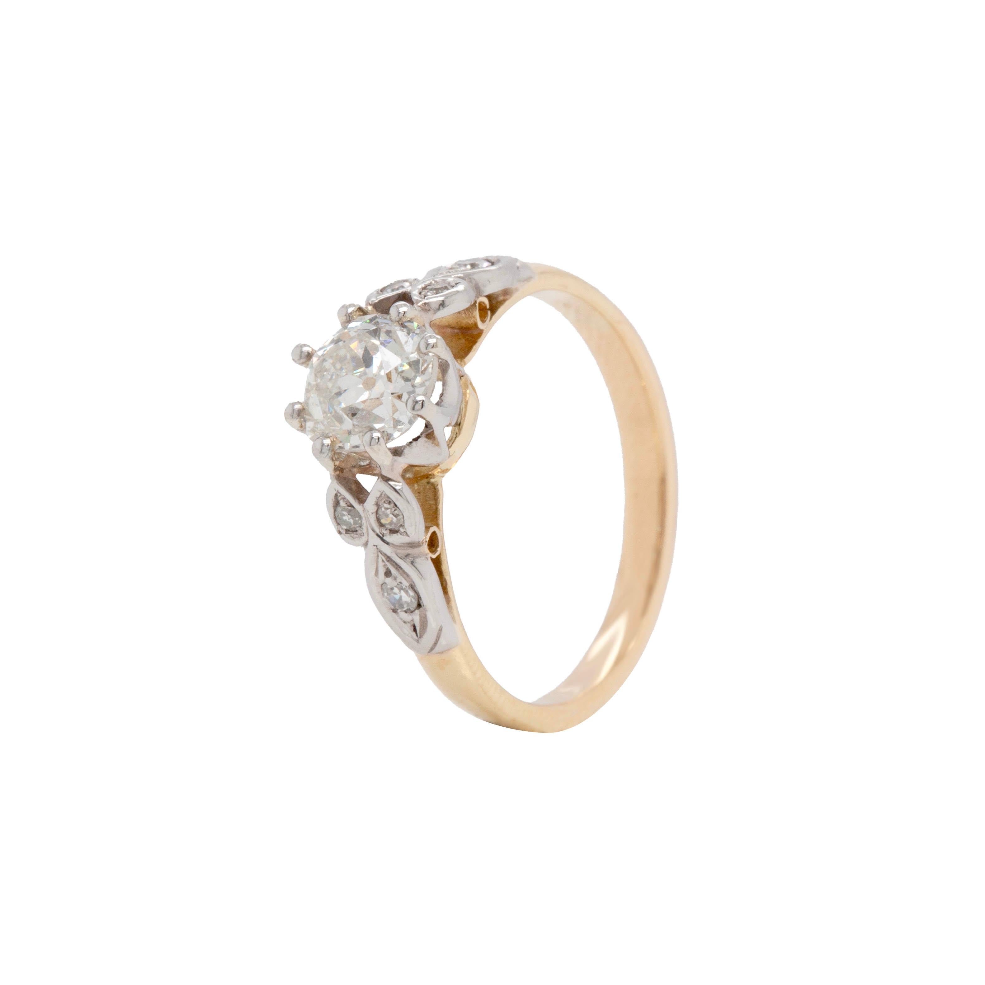 This captivating engagement ring is a true testament to the elegance of a bygone era, perfect for the antique lovers.

Masterfully crafted from luxurious precious metals, platinum and 18 carat white gold, the fantastic ring showcases a charming