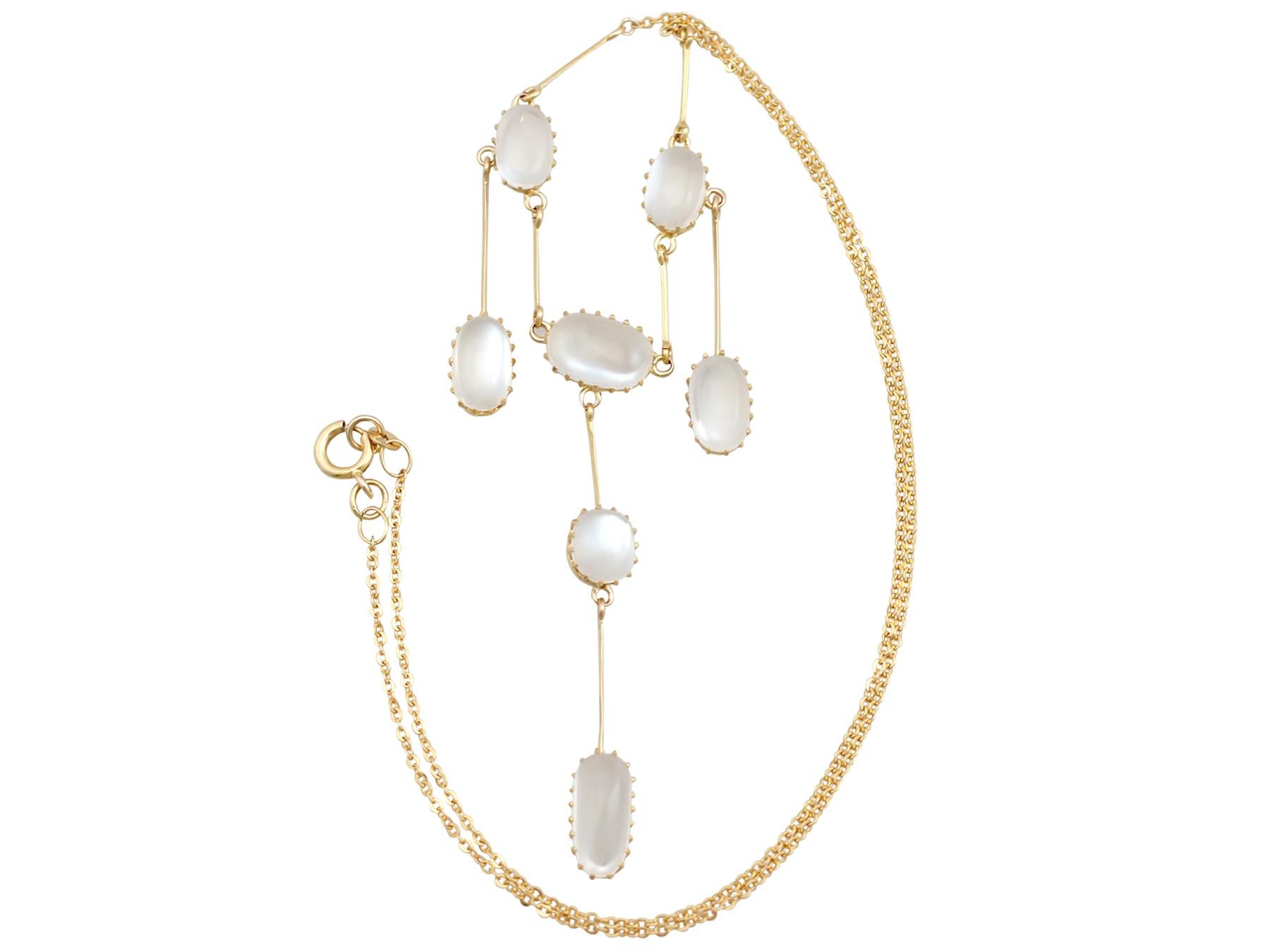 A stunning, fine and impressive antique 10.35 carat moonstone and 12 karat yellow gold pendant, 9 karat yellow gold necklace; part of our Victorian jewelry and estate jewelry collections.

This stunning, fine and impressive antique cabochon cut