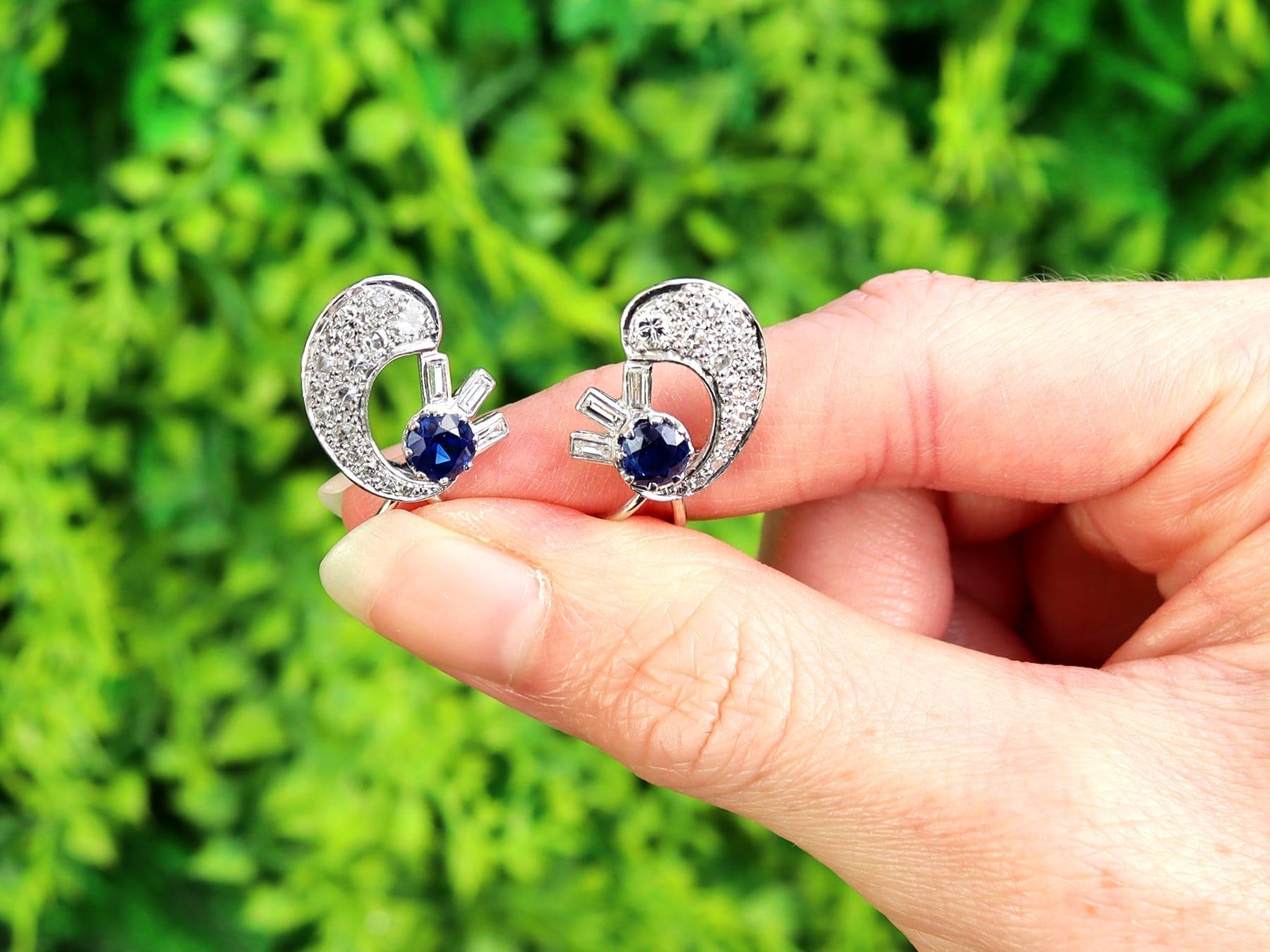 An impressive pair of 1.04 carat sapphire and 1.75 carat diamond, 18 karat and 9 karat white gold clip on earrings; part of our diverse antique jewelry and estate jewelry collections.

These fine and impressive antique sapphire earrings have been