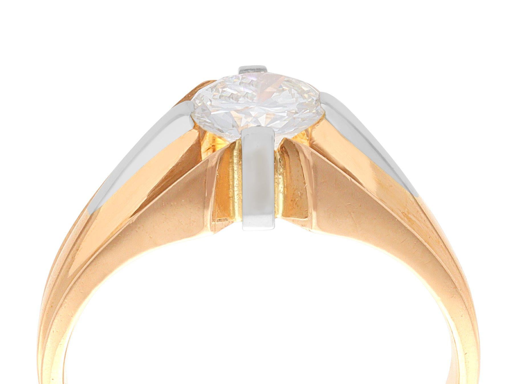 A stunning, fine and impressive antique 1.07 carat diamond and 18 karat yellow gold gent's solitaire ring; part of our diverse diamond jewelry collections

This stunning antique solitaire ring has been crafted in 18k yellow gold.

The impressive