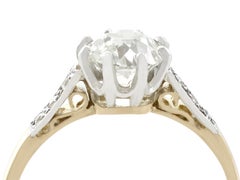 Antique 1.08 Carat Diamond and Yellow Gold, Platinum Set Solitaire Ring