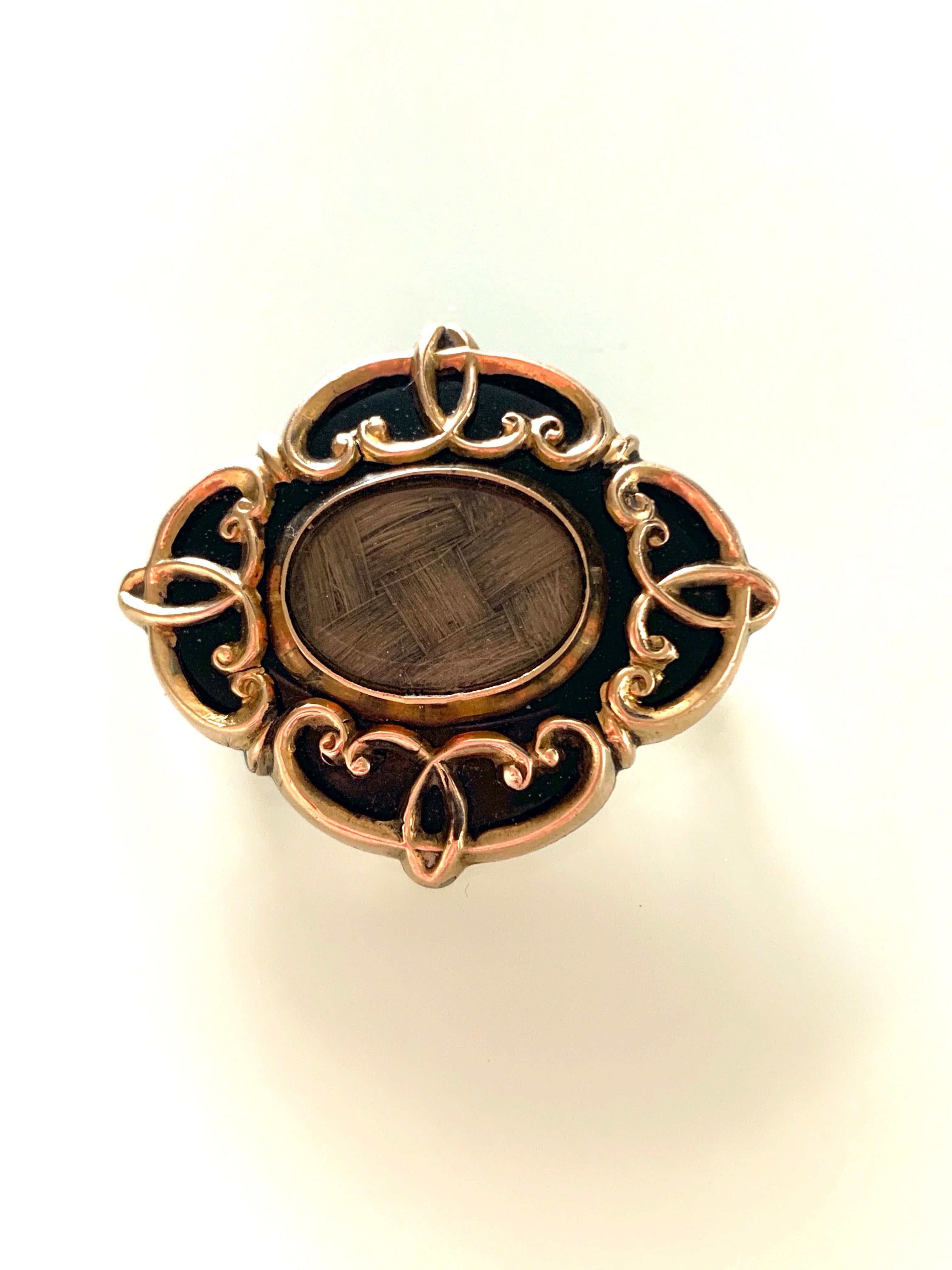 Antique Victorian Memorial Brooch/Pendant
with encase woven hair sample of the deceased
made from 10ct Gold & onyx
unmarked for 10ct gold
has been texted with XRF in Hatton Garden,London
Weight 10.69 grams
size 3.5cm x 3.2cm x 3mm