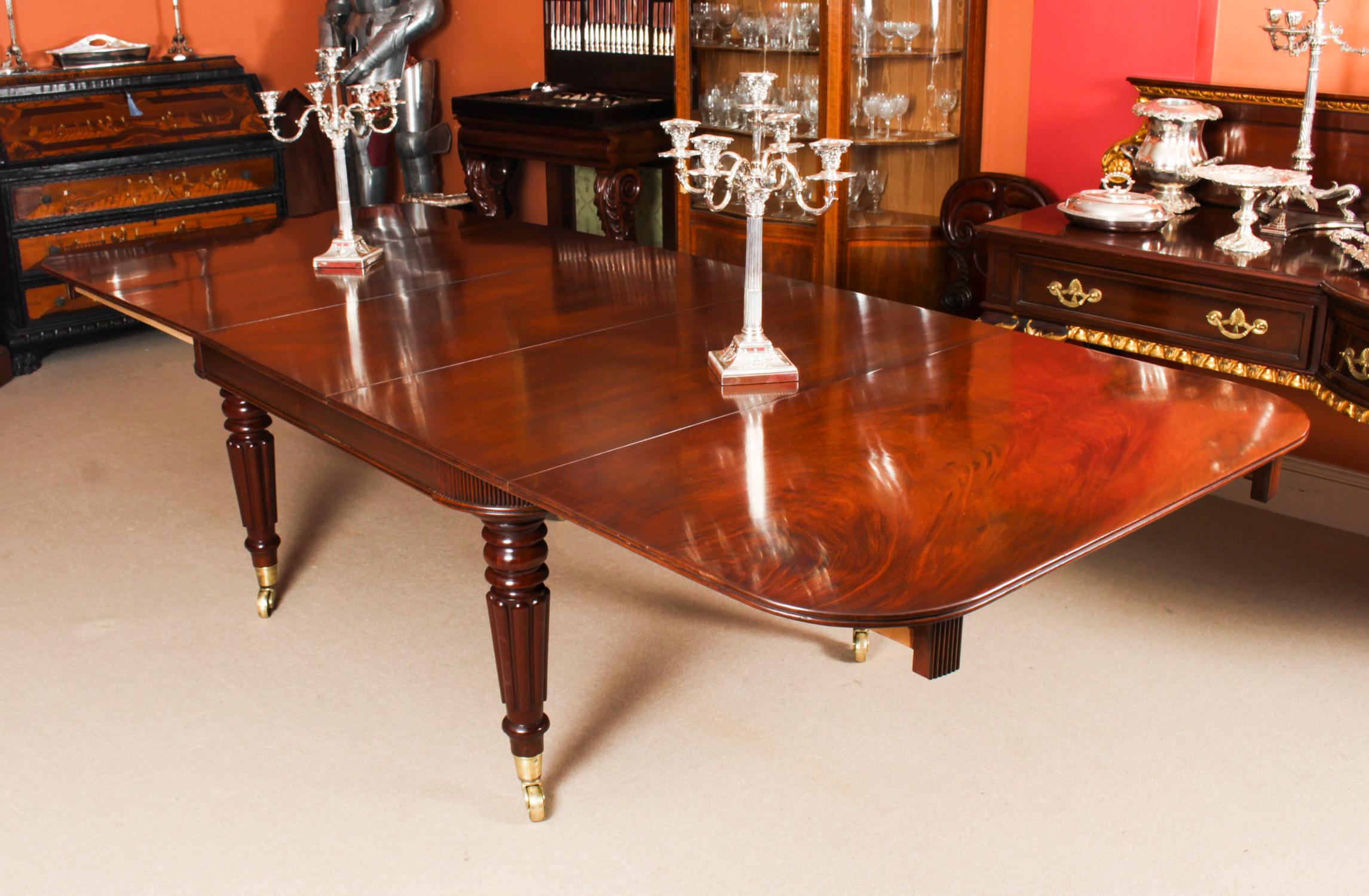 A very rare opportunity to own an antique English Regency dining room table, Circa 1820 in date, which can seat ten people in comfort.
 
The table is made of beautiful solid flame mahogany, which can be seen in the photos of the top with it's