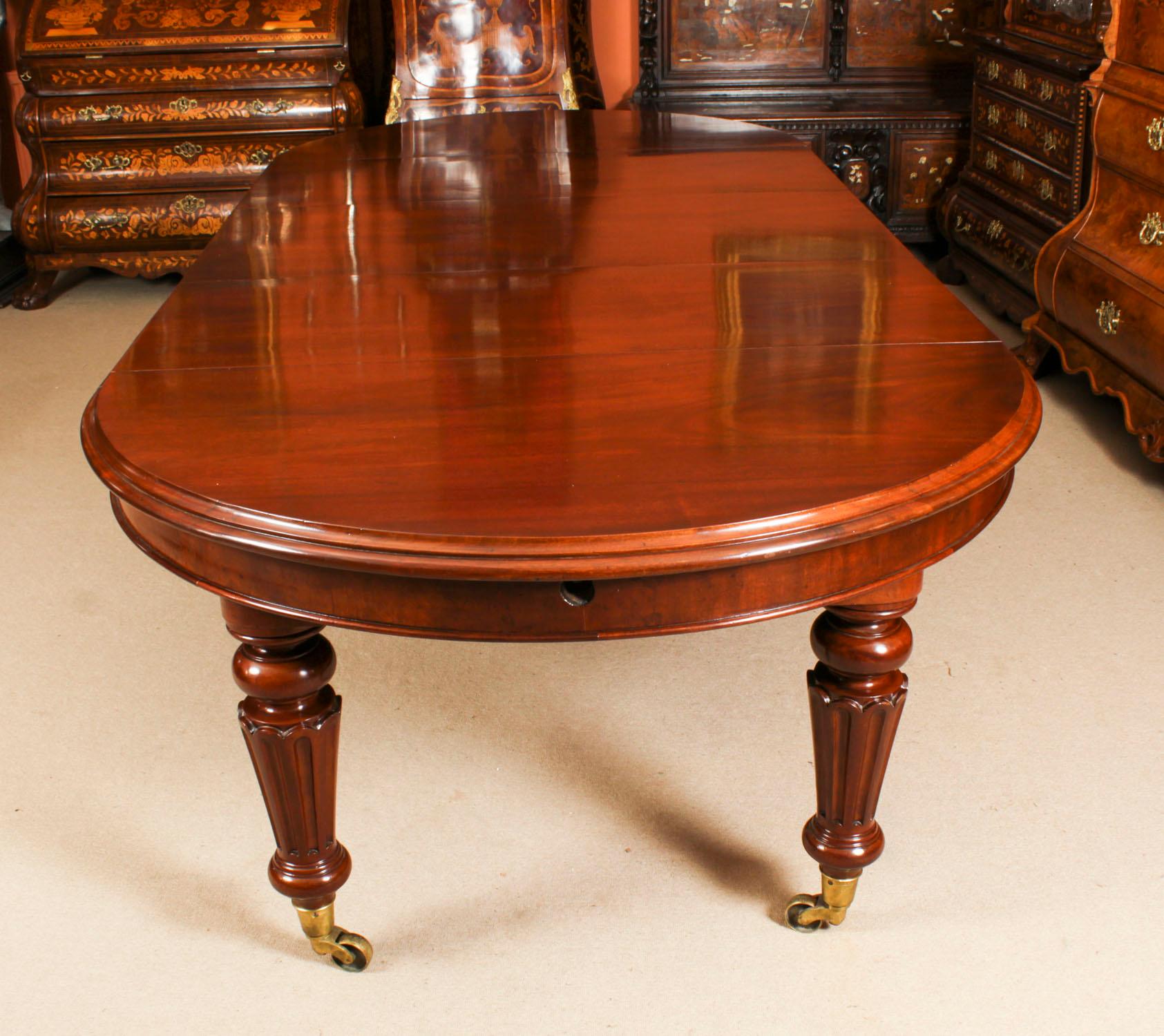 This is a fabulous antique Victorian flame mahogany extending dining table, circa 1860 in date. 

The table has three original leaves, can comfortably seat ten and it has been hand-crafted from solid flame mahogany which has a beautiful grain and