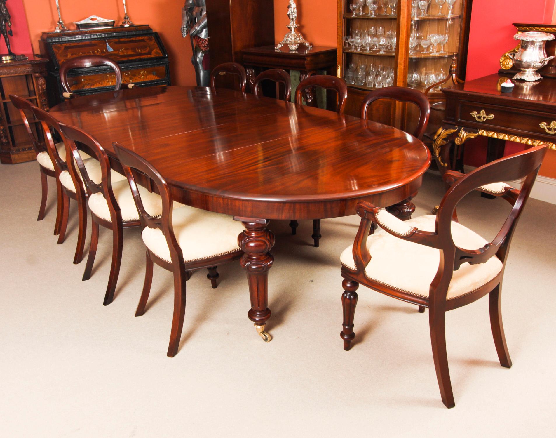 This is a fabulous antique Victorian oval flame mahogany extending dining table, circa 1850 in date. 
 
The table has two original leaves and can comfortably seat ten. It has been hand-crafted from flame mahogany which has a beautiful grain and