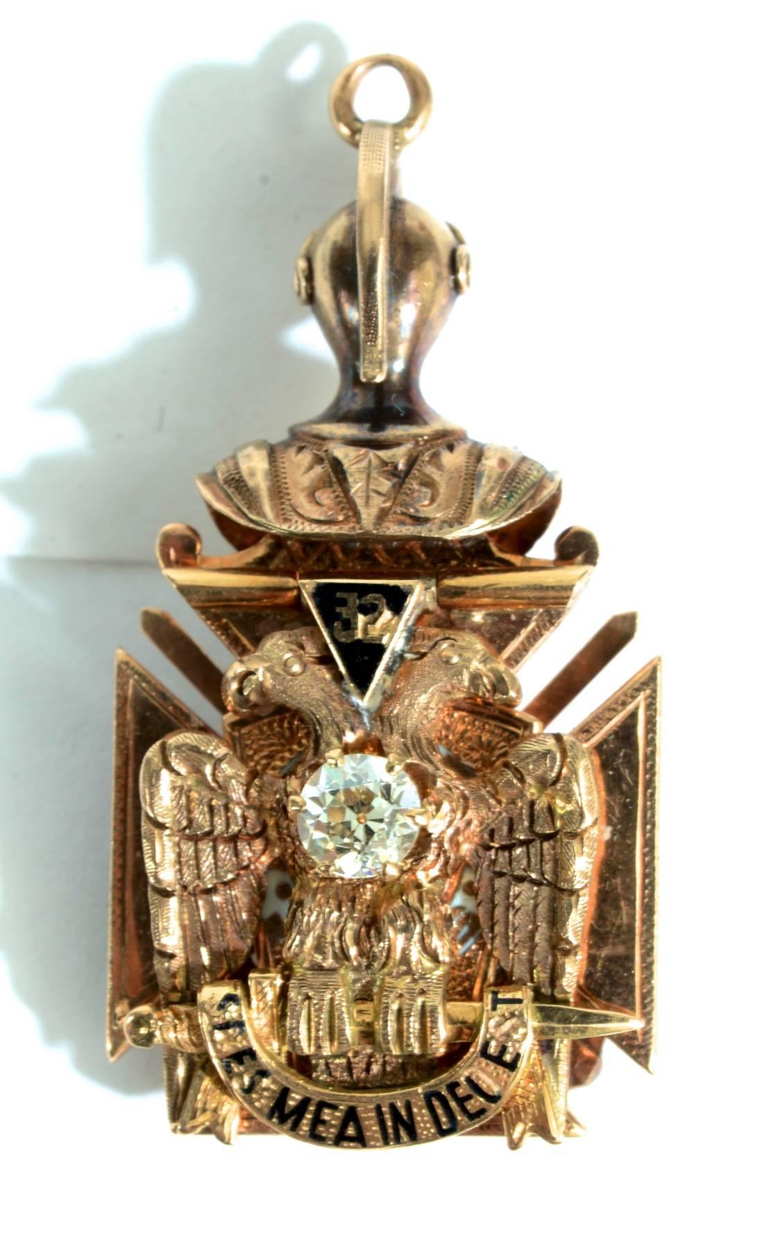 Antique 10K Yellow Gold Enamel Free Masons Masonic 32nd Degree, Knights Templar Bi-Fold Watch Fob Pendant Charm. A heavy solid gold bi-fold with symbols, engravings and enamel. The back features the two headed eagle and the 32nd degree in black