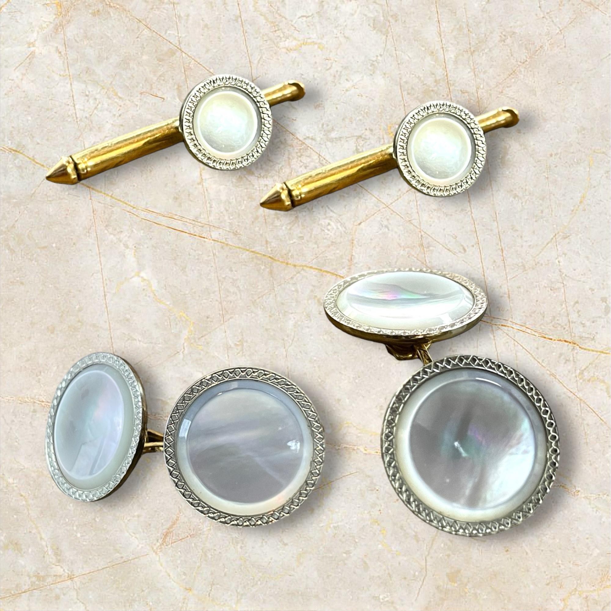 Elevate your formal attire with this exquisite Antique 10K Gold Mother of Pearl Cufflink and Shirt Stud Set. Each piece features lustrous mother of pearl set in rich 10K gold, offering a touch of vintage sophistication and timeless elegance. Perfect