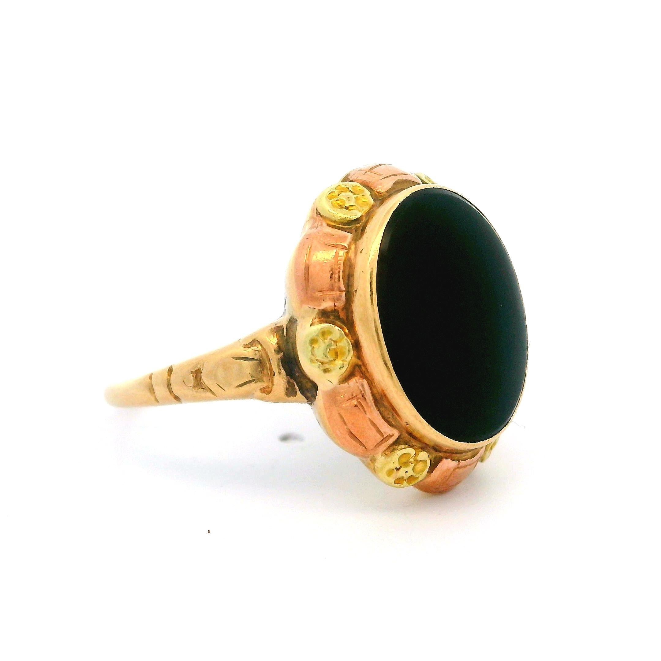 –Stone(s)–
(1) Natural Genuine Onyx - Oval Cut - Bezel Set - Black Color  - 13.58 x 11.6mm (approx.)

Material: 10k Yellow Gold - 10k Green & Rose Gold Accents
Weight: 3.58 Grams
Ring Size: 8.5 (fitted on finger, please contact us prior to purchase