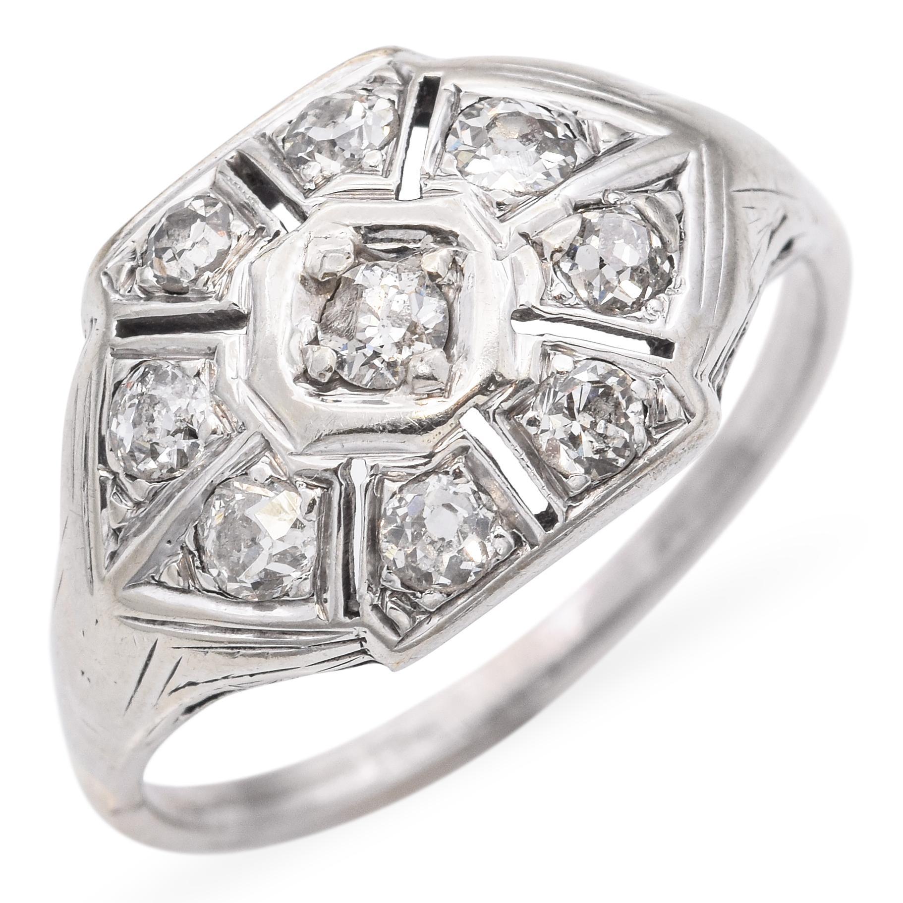 This antique 10k white gold ring features a classic diamond centerpiece set in a delicate, vintage-style setting. The soft luster of the white gold enhances the diamond’s sparkle while adding an old-world charm. Subtle yet elegant, it’s perfect as a