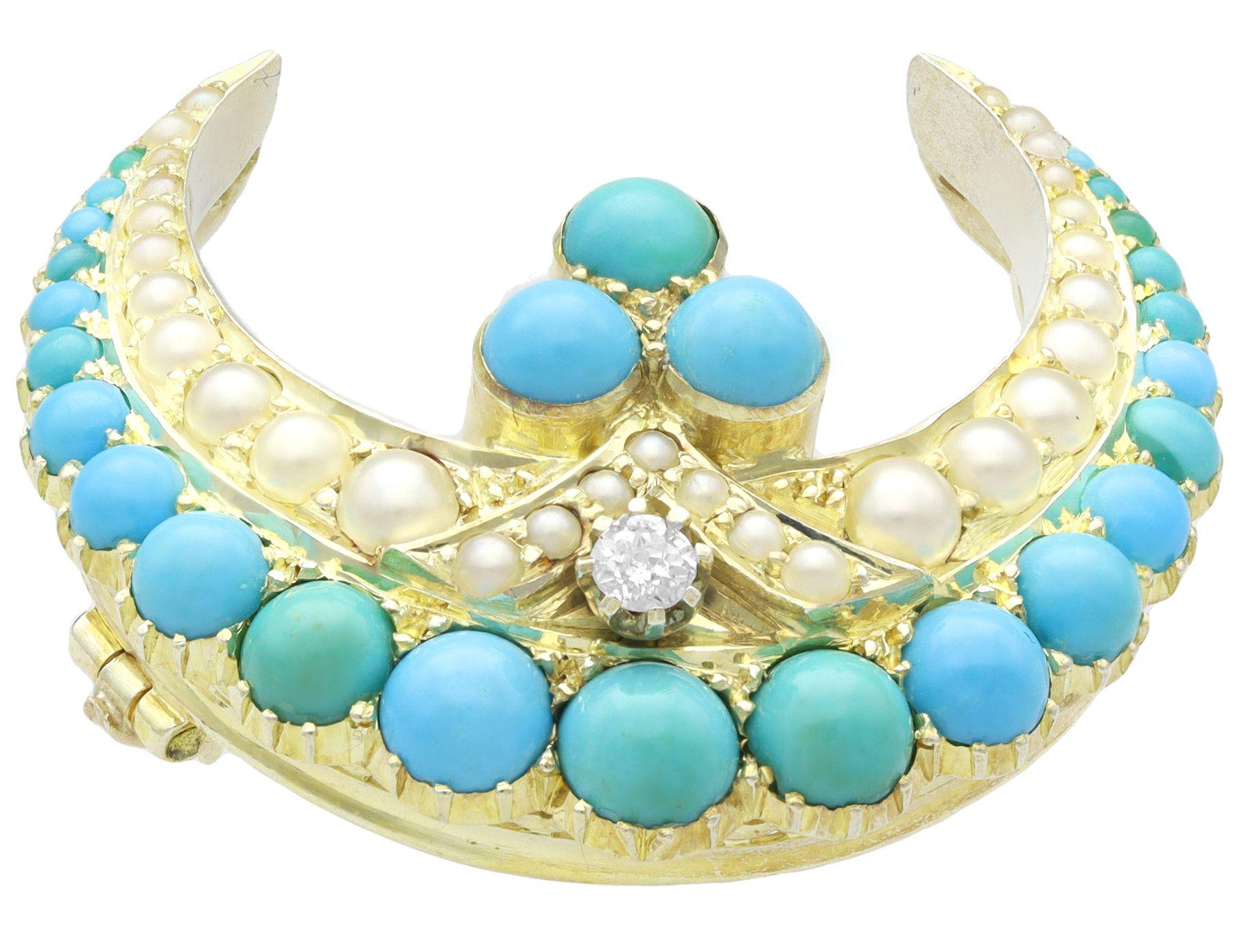 A stunning, fine and impressive Victorian 1.10 carat diamond, 1.90 carat turquoise, pearl, 9 karat yellow gold and silver set brooch; part our antique jewelry/estate jewelry collections.

This stunning, fine and impressive antique turquoise brooch