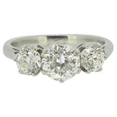 Anillo antiguo de tres piedras con diamantes talla antigua de 1.10 quilates