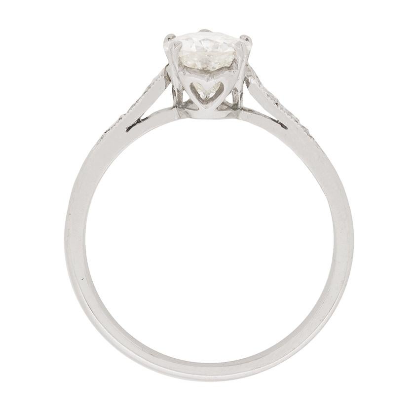 This stunning Edwardian engagement ring features a pear shaped old cut diamond, set within a beautiful platinum mount. The centre stone has a weight of 1.10 carat and is a H in colour and SI1 in clarity. The stone has been independently certified by