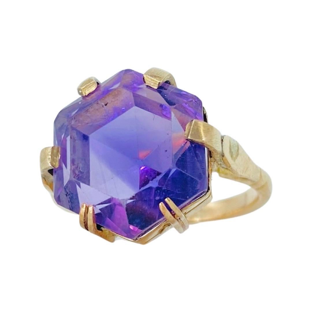 Antique 11.07 Carat Octagon Single Cut Amethyst Cocktail Ring 9k. The Amethyst measures 13.5mm X 14.5mm X 9.7mm for a total of 11.07 carat weight. The ring is made in 9 karat gold and is a size 6. The ring weights 5.4 grams.