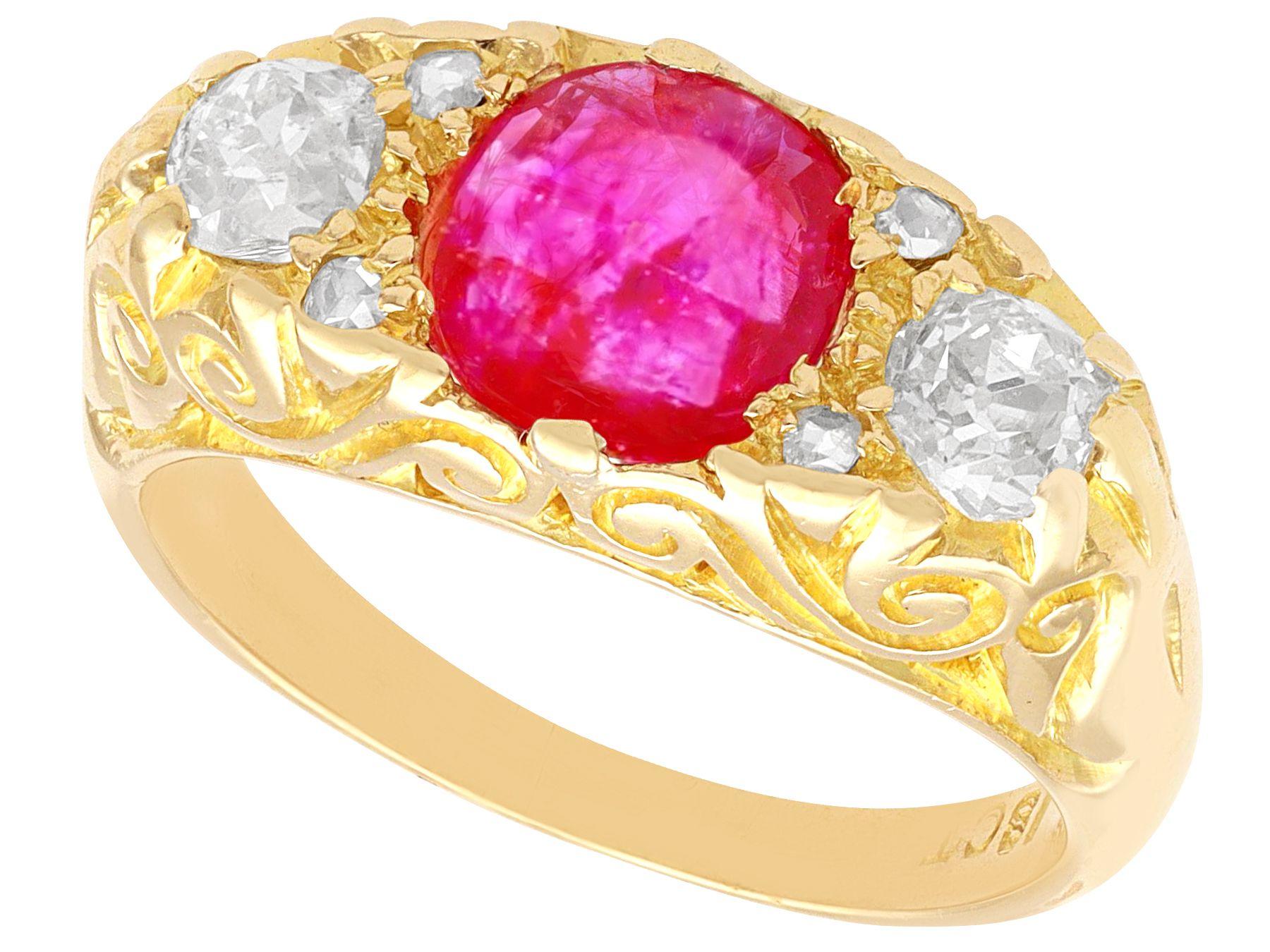 A stunning, fine and impressive 1.15 carat Burmese ruby and 1.36 carat diamond, 18 karat yellow gold three stone ring; part of our diverse gemstone ring collection.

This stunning, fine and impressive antique ruby and diamond ring has been crafted