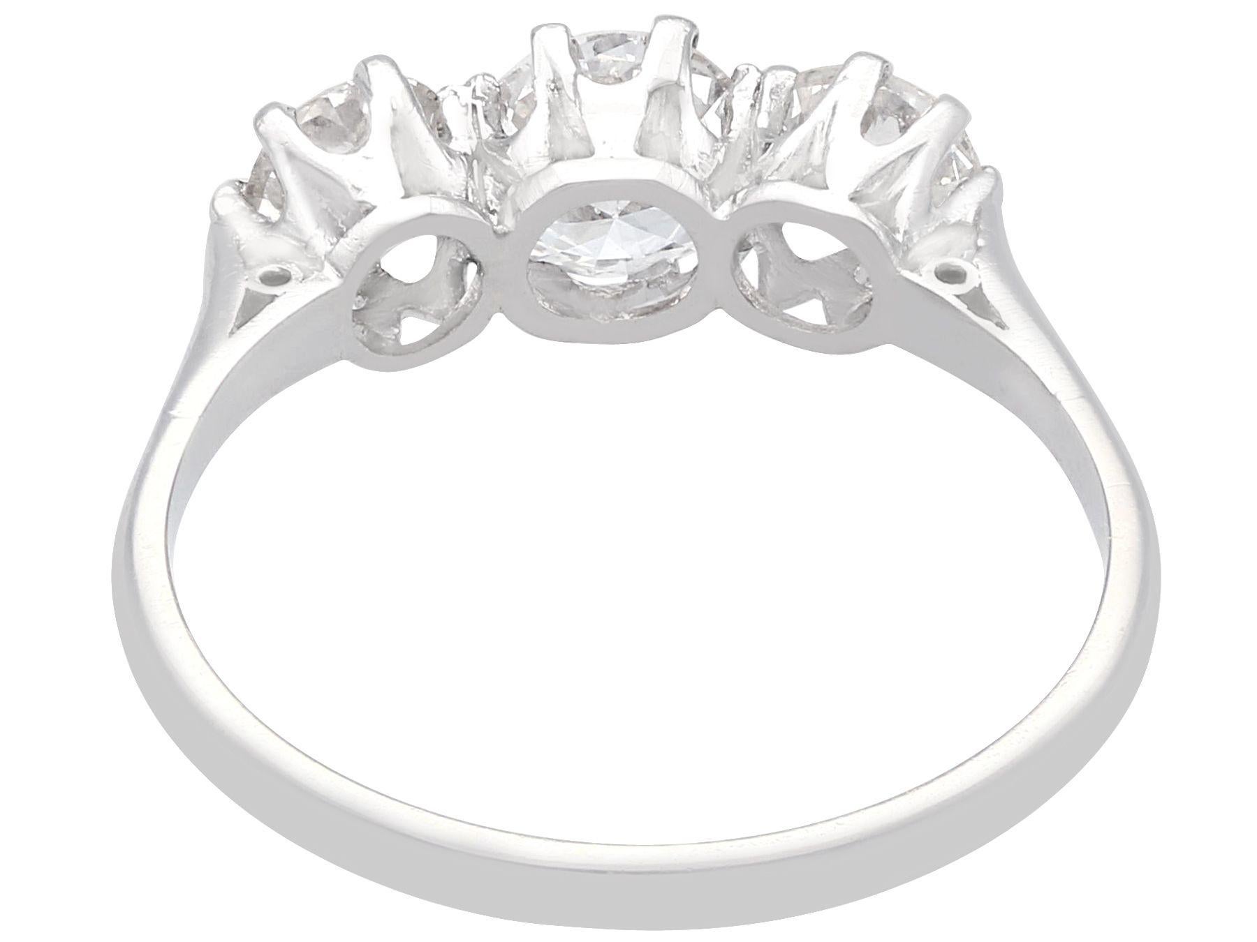Women's or Men's Antique 1.16 Carat Diamond and Platinum Three Stone Ring For Sale