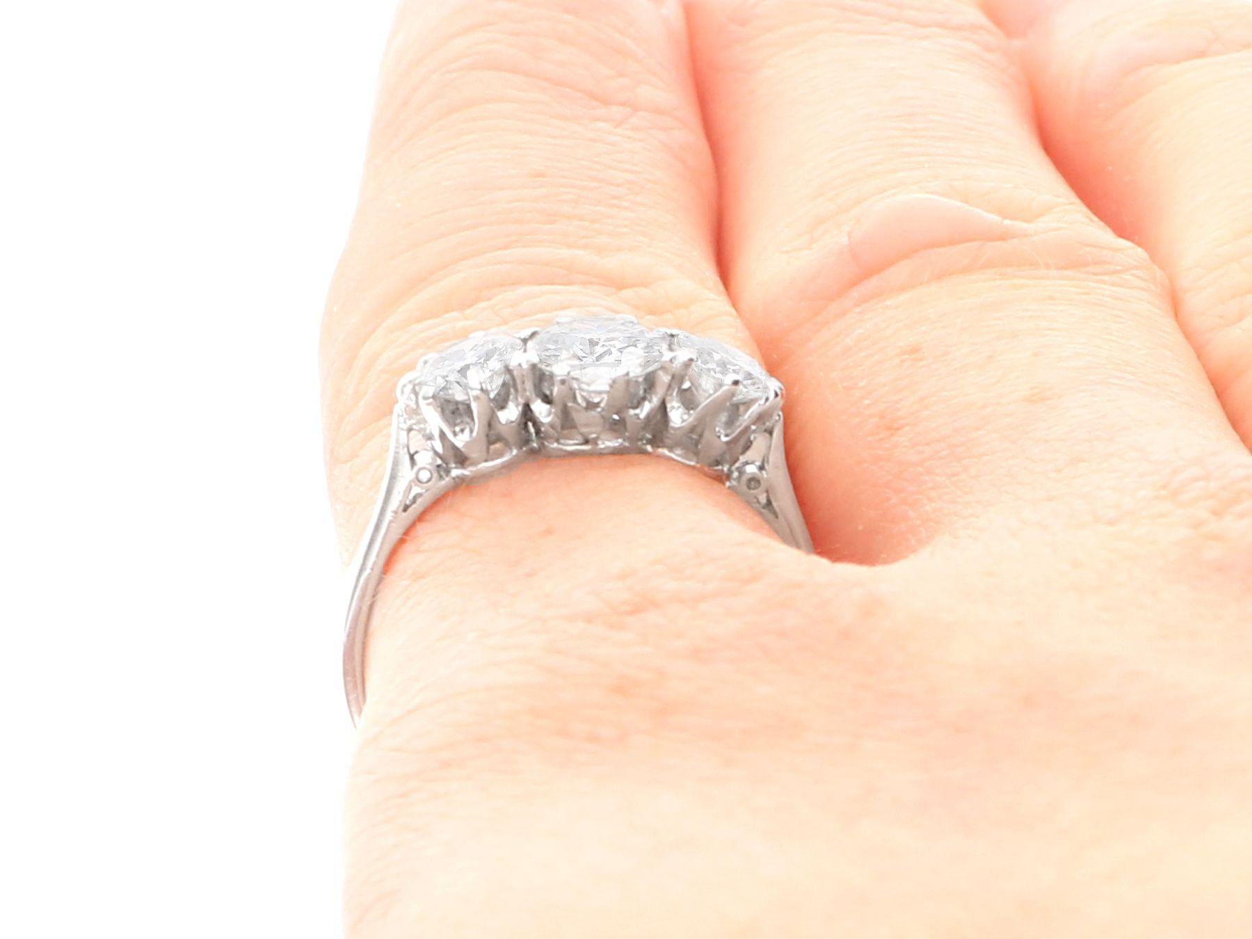 Antique 1.16 Carat Diamond and Platinum Three Stone Ring For Sale 4