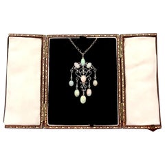 Antique 11.70 Carat Cabochon Cut Opal and Diamond Yellow Gold Pendant