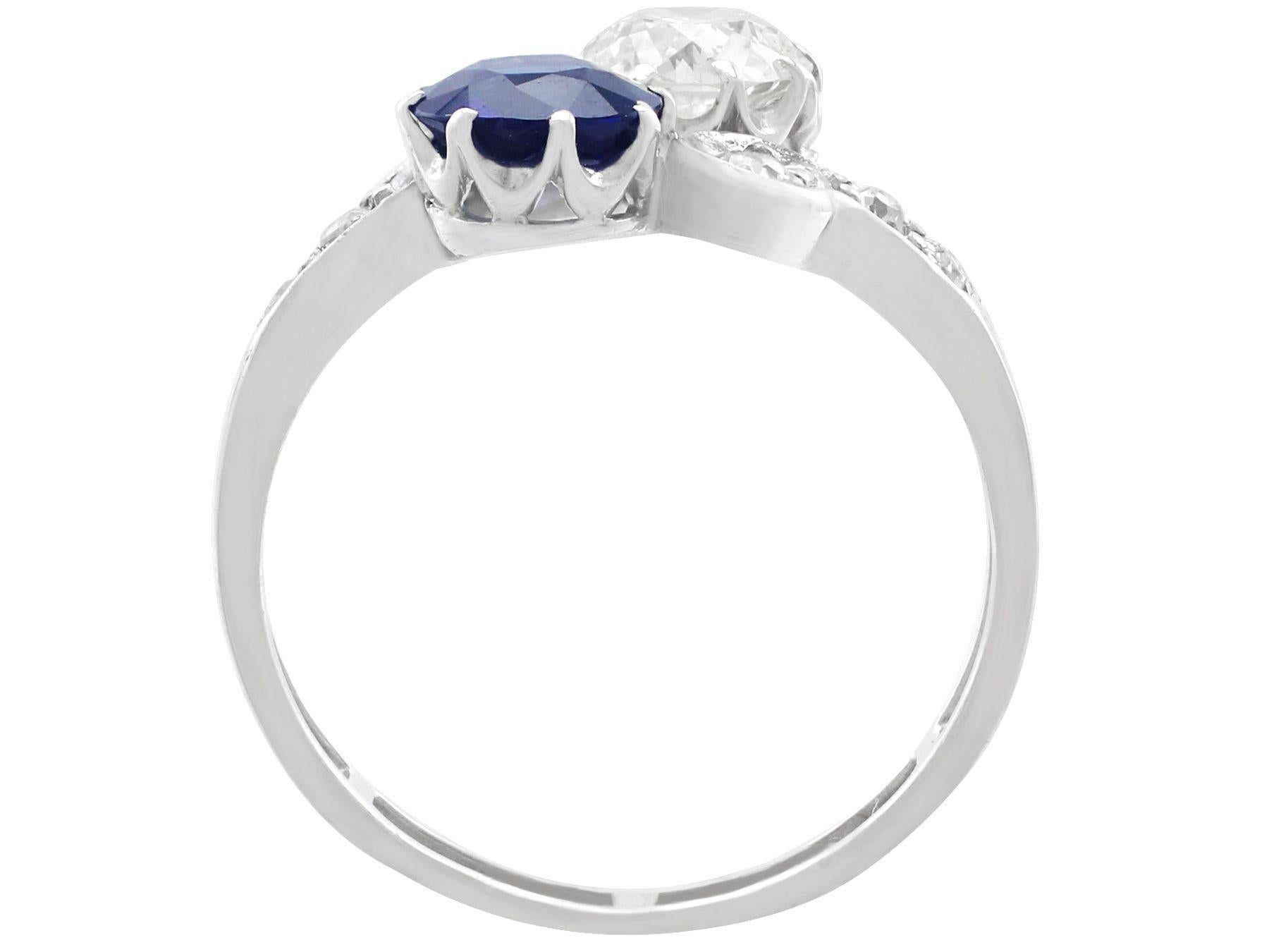 Round Cut Antique 1.19 Carat Sapphire and 1.28 Carat Diamond White Gold Twist Ring For Sale