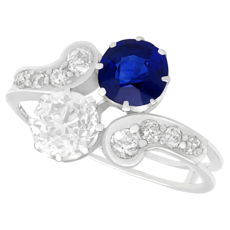 Antique 1.19 Carat Sapphire and 1.28 Carat Diamond White Gold Twist Ring For Sale