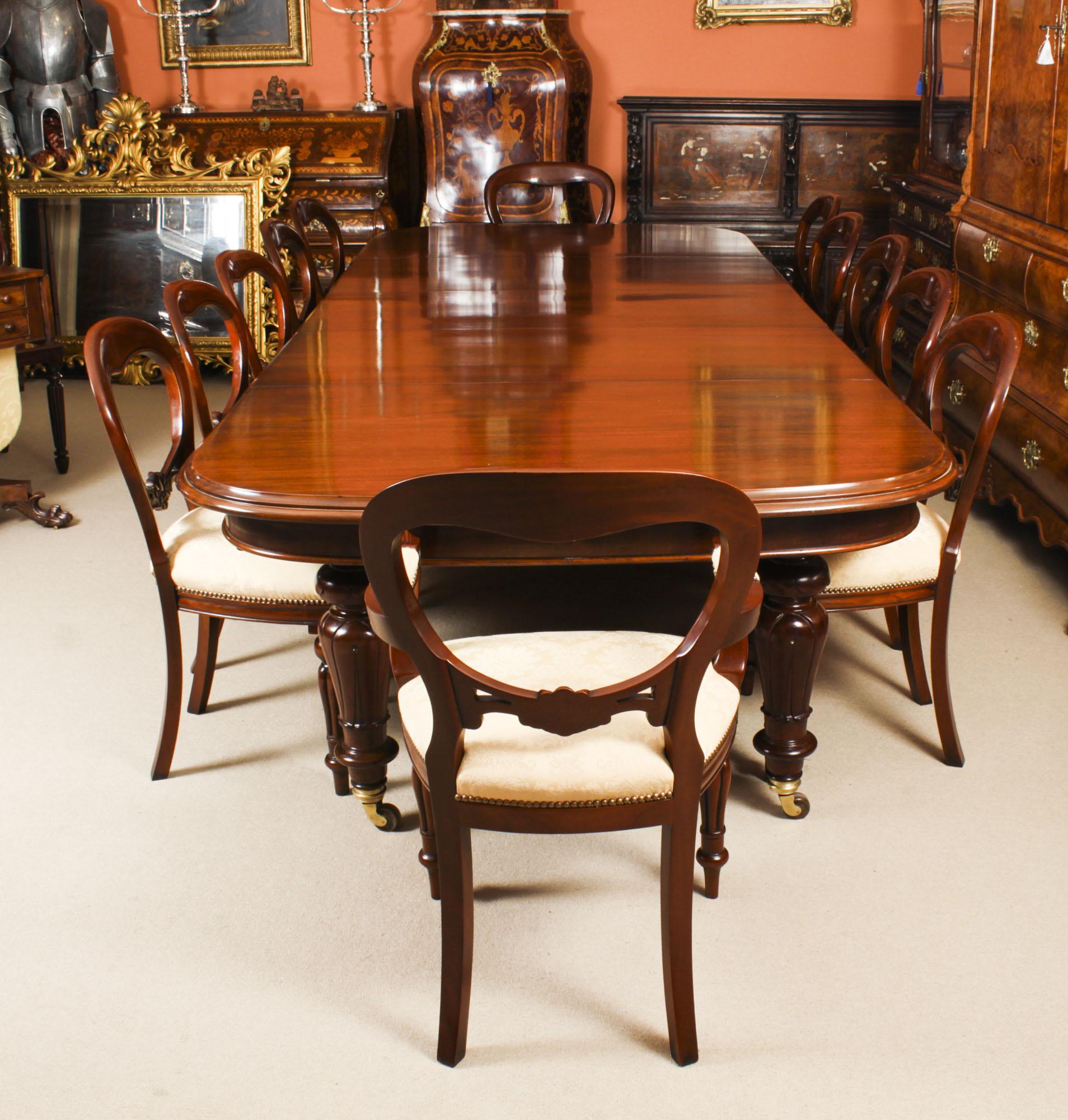 This is a magnificent antique Victorian mahogany D-end dining table C1850 in date and 12 baloon back chairs.
 
This beautiful table is in stunning solid flame mahogany and can seat twelve diners in comfort. It has three original leaves, 2x 60cm