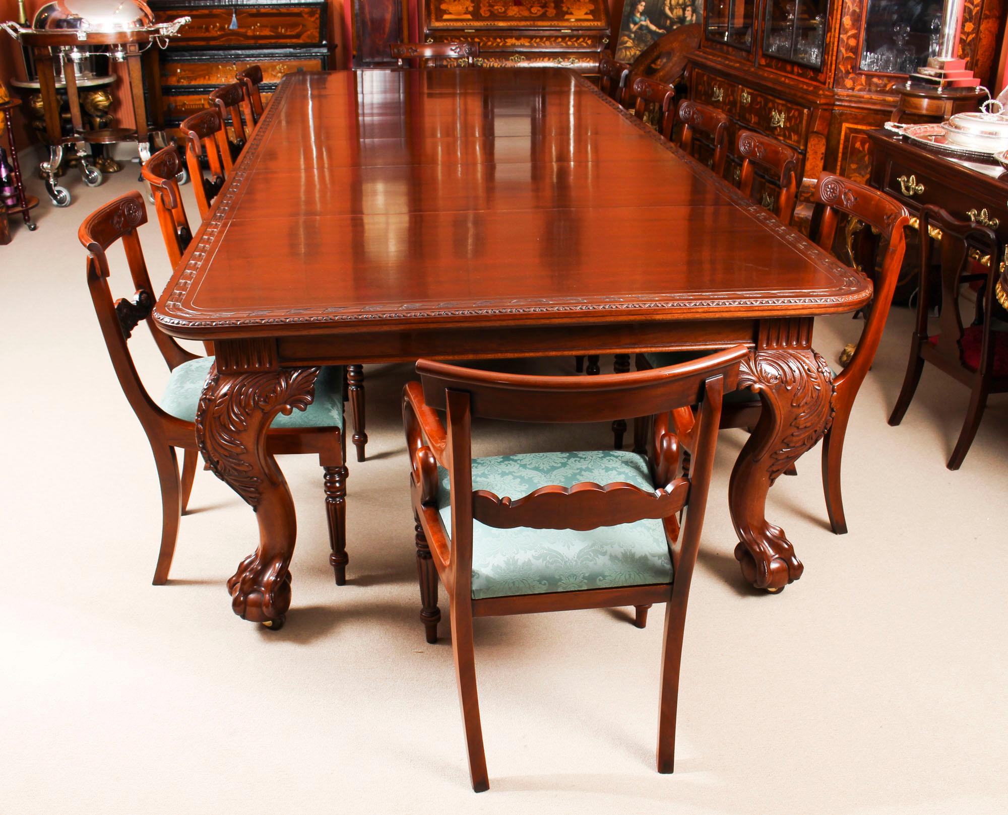 This is a beautiful flame mahogany Victorian dining set comprising an antique extending dining table, by Edwards & Roberts, Wardour Street, London, and dating from the 1880s and a set of twelve vintage dining chairs.

This amazing antique dining