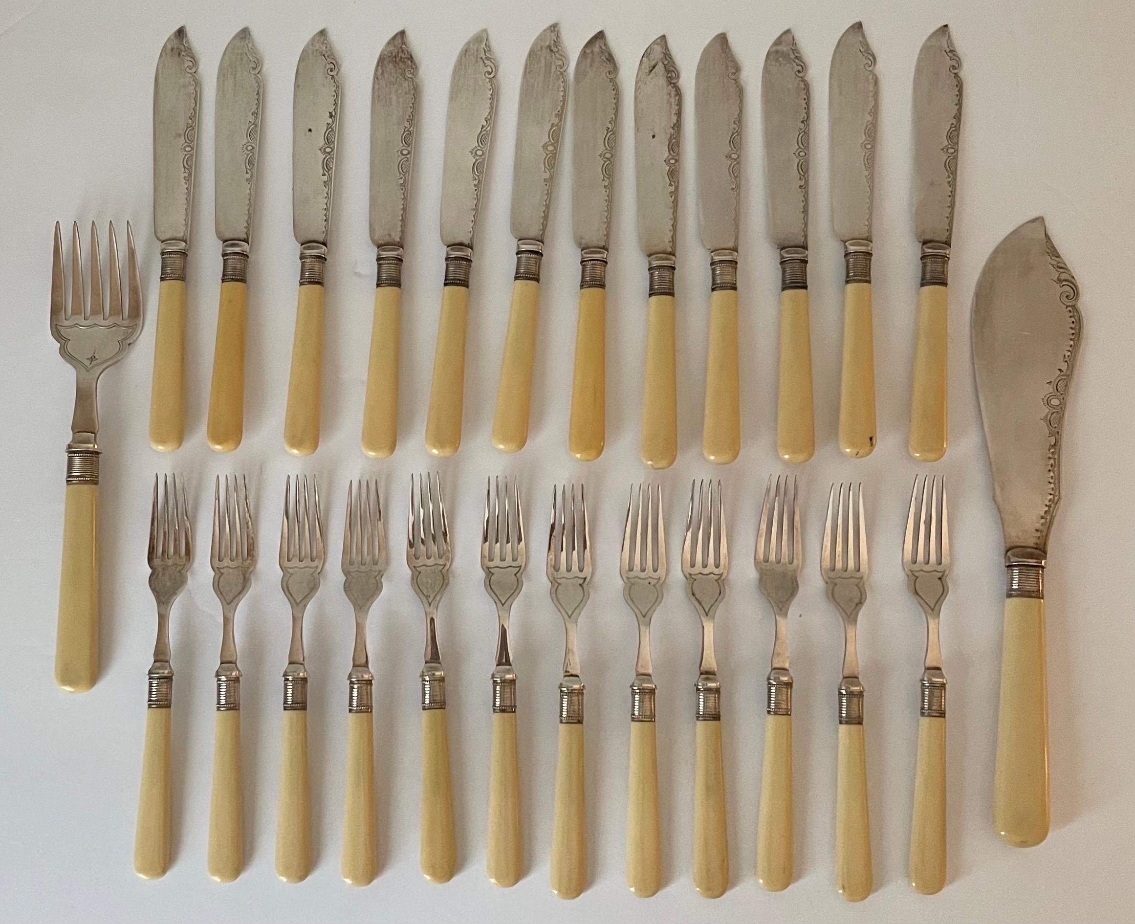 12-Place Fish Service by Hamilton-Laidlaw, Glasgow Circa 1877-1878. Sterling with simulated bone handles. Unoriginal storage bags are included. 
12 Fish forks each measure: 7” tall x 0.75” wide 
12 Fish knives each measure: 8” tall x 1” wide 
1
