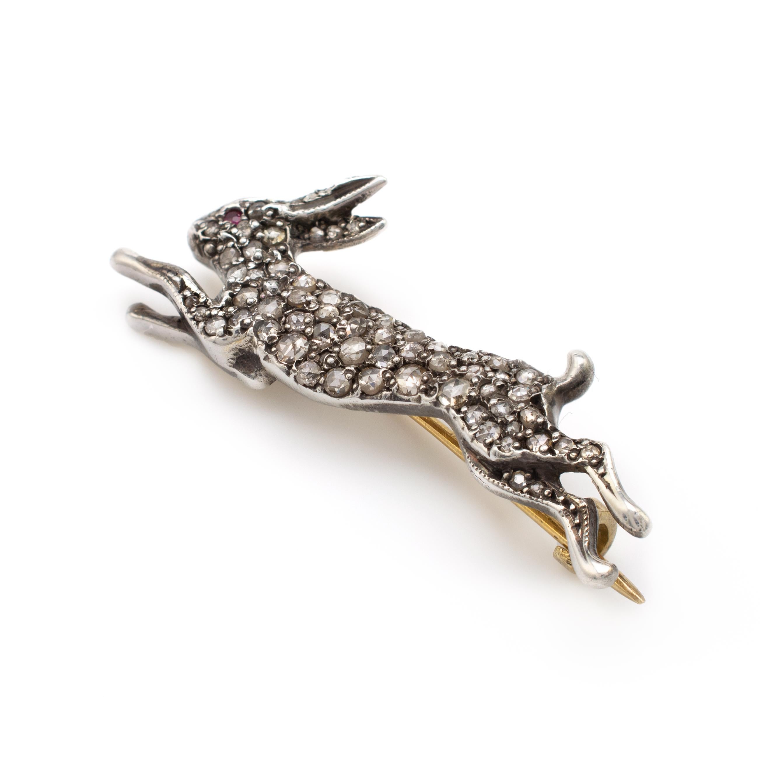 This antique diamond and ruby Hare brooch dates circa 1920

A superb piece for the collector, this running Hare brooch is encrusted throughout with graduating old and rose-cut diamonds estimated to weigh a total of 1.20 carats. The chunky stones are