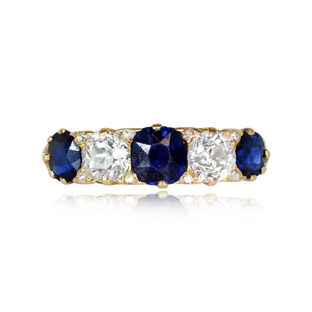 An exquisite antique five-stone ring adorned with cushion-cut natural sapphires and old European cut diamonds. The sapphires total approximately 1.20 carats, while the featured diamonds weigh around 0.60 carats combined, exhibiting I color and VS2