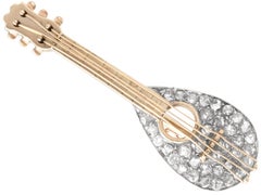 Antike Mandolin-Brosche aus 9k Gelbgold mit 1,25 Karat Diamanten, um 1890