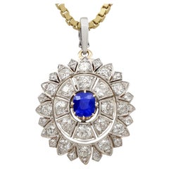 Antique 1.25 Carat Sapphire and 3.43 Carat Diamond Yellow Gold Pendant Brooch