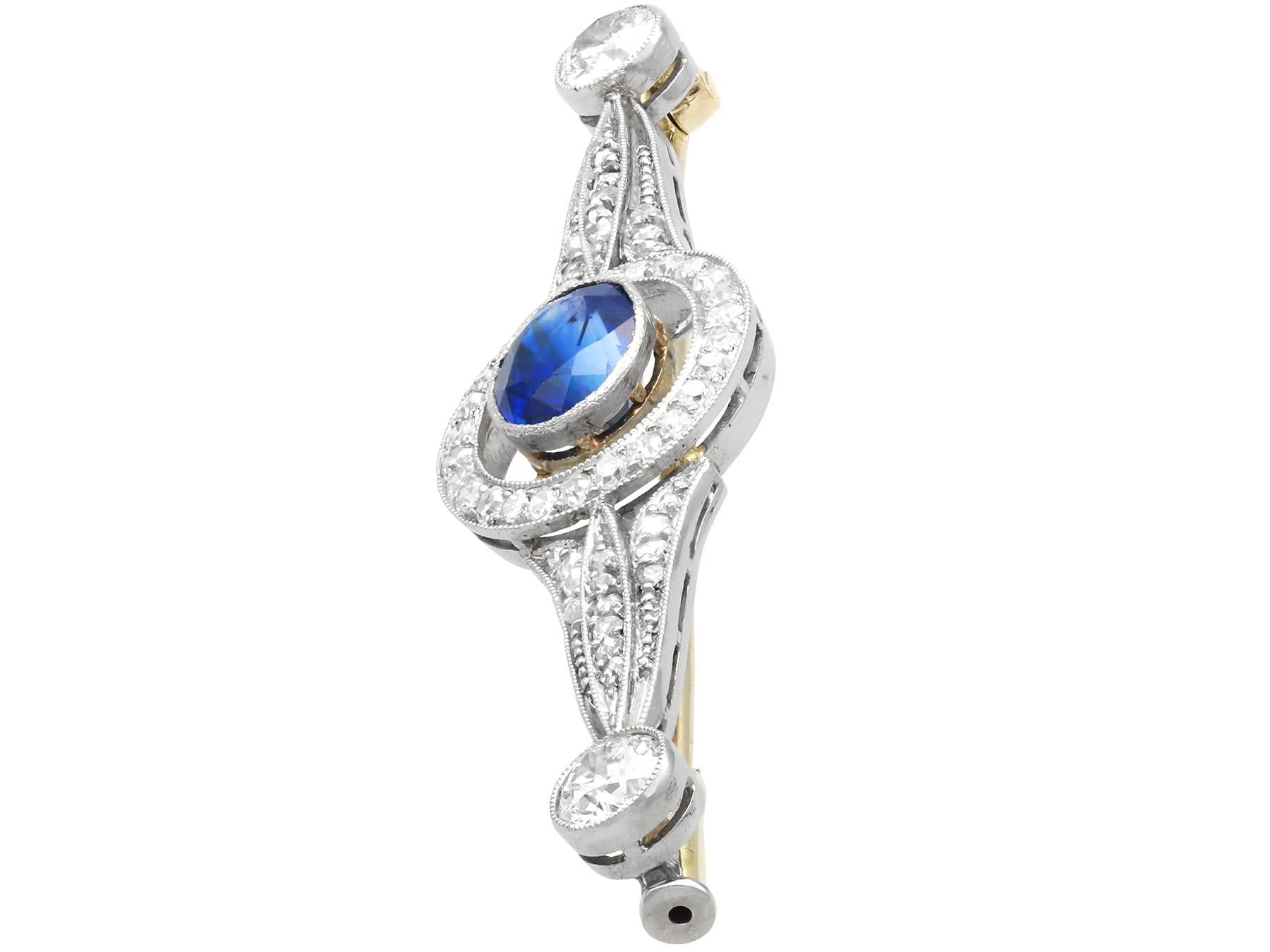 Oval Cut Antique 1.25Ct Sapphire 2.34Ct Diamond and Platinum Brooch Circa 1925 For Sale