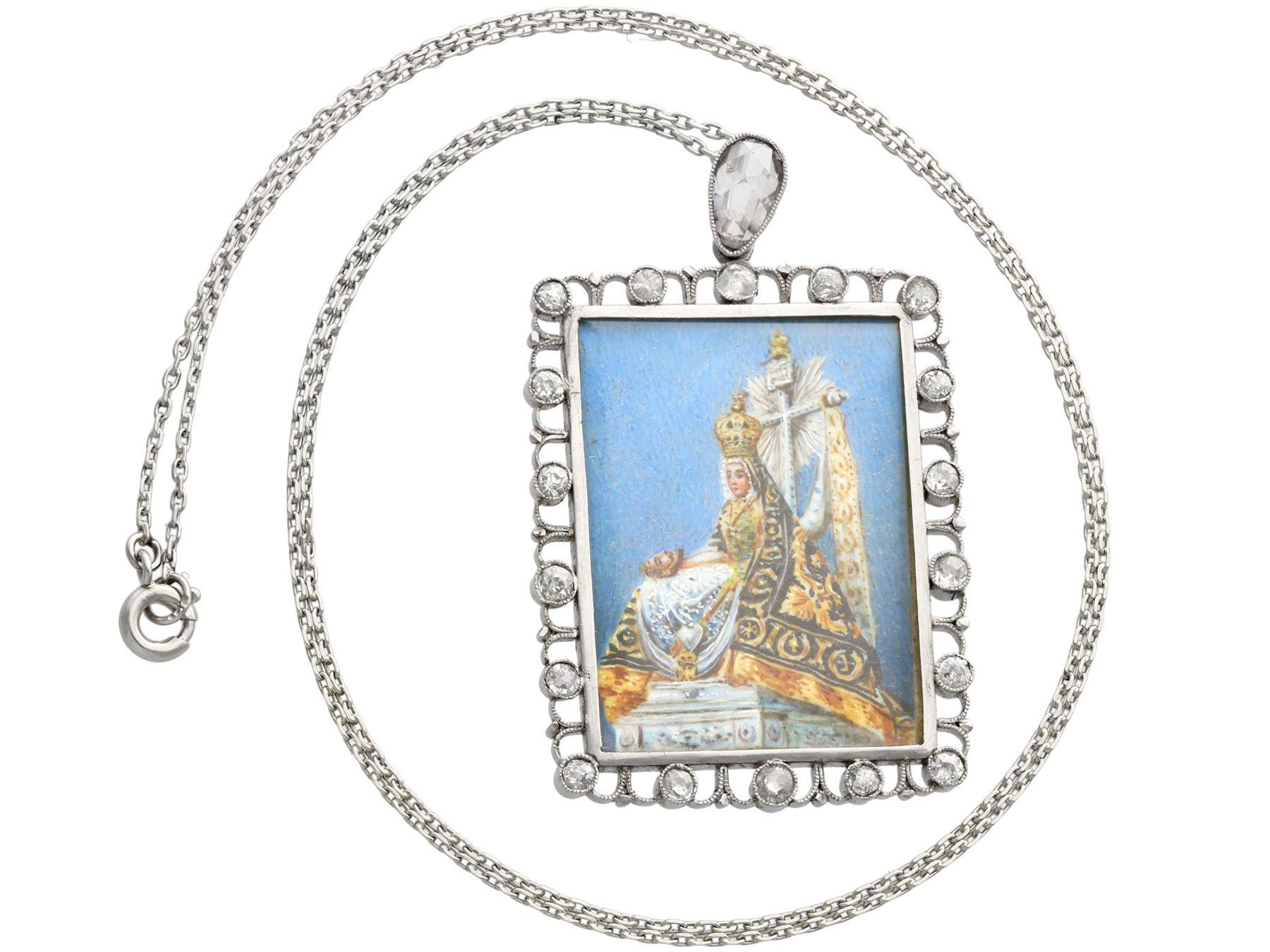 A fine and impressive antique hand painted enamel and 1.28Ct diamond platinum miniature portrait pendant; part of our diverse antique jewelry and estate jewelry collections.

This exceptional, fine and impressive antique diamond pendant has been