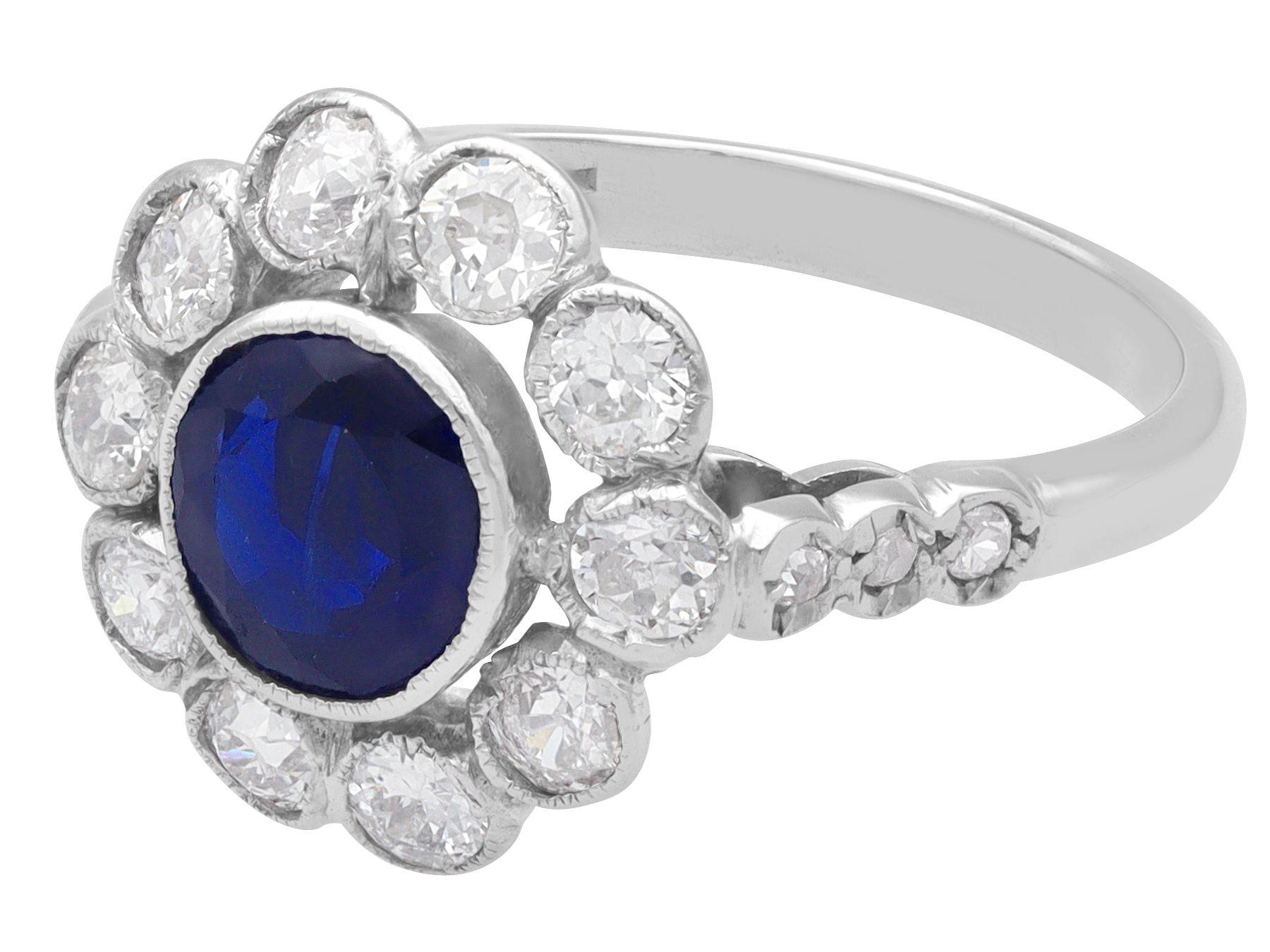 Cushion Cut Antique 1.28 Carat Sapphire and 1.20 Carat Diamond White Gold Cluster Ring For Sale