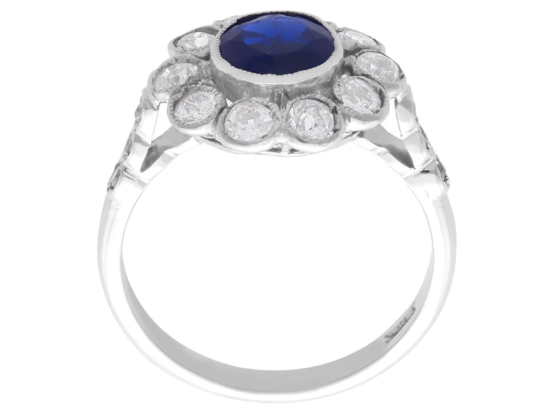 Women's or Men's Antique 1.28 Carat Sapphire and 1.20 Carat Diamond White Gold Cluster Ring For Sale