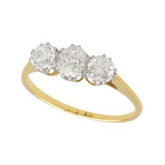 Antique 1.29 Carat Diamond and Yellow Gold Platinum Set Trilogy Ring