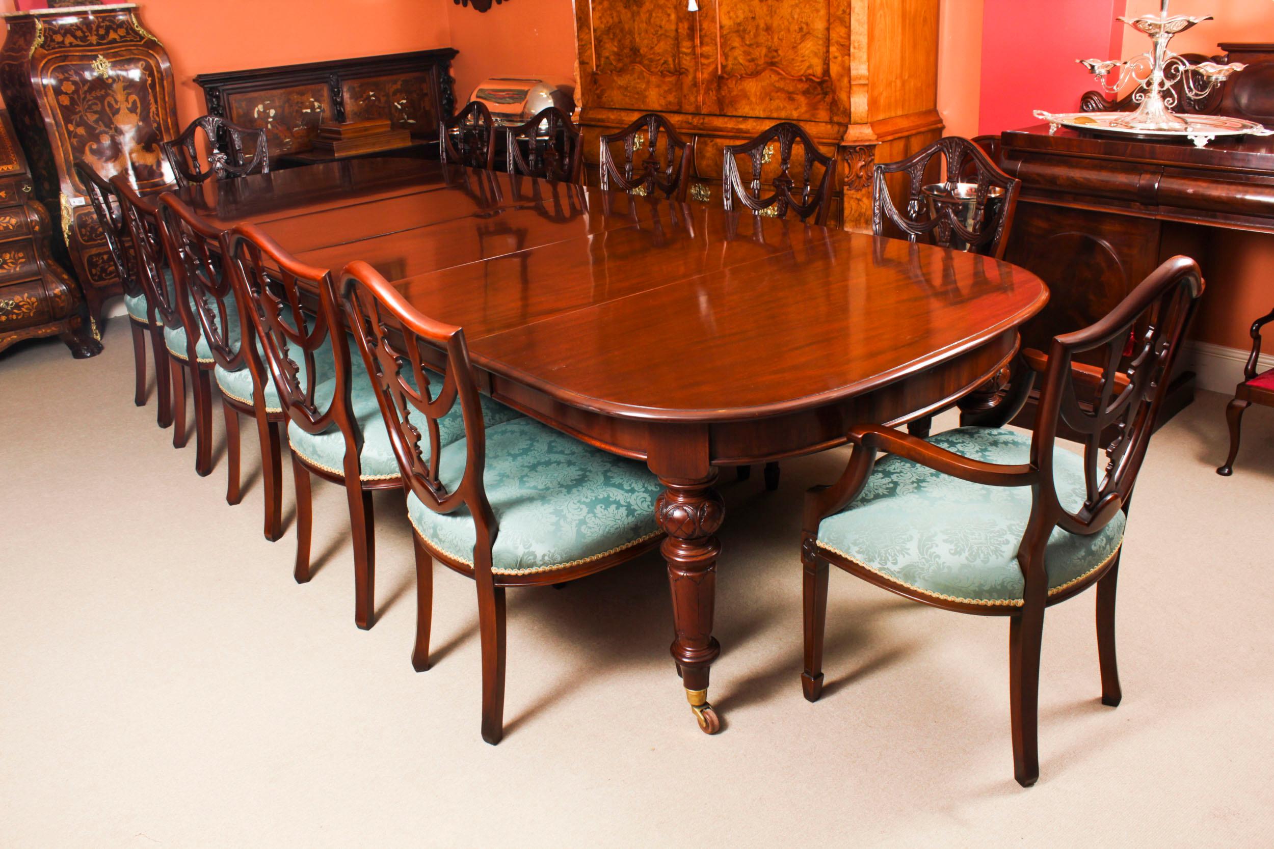 This is a superb antique Victorian flame mahogany dining table, Circa 1860 in date.

This amazing table can seat twelve people in comfort and has been hand-crafted from solid flame mahogany.

This superb mahogany table has five leaves which can be