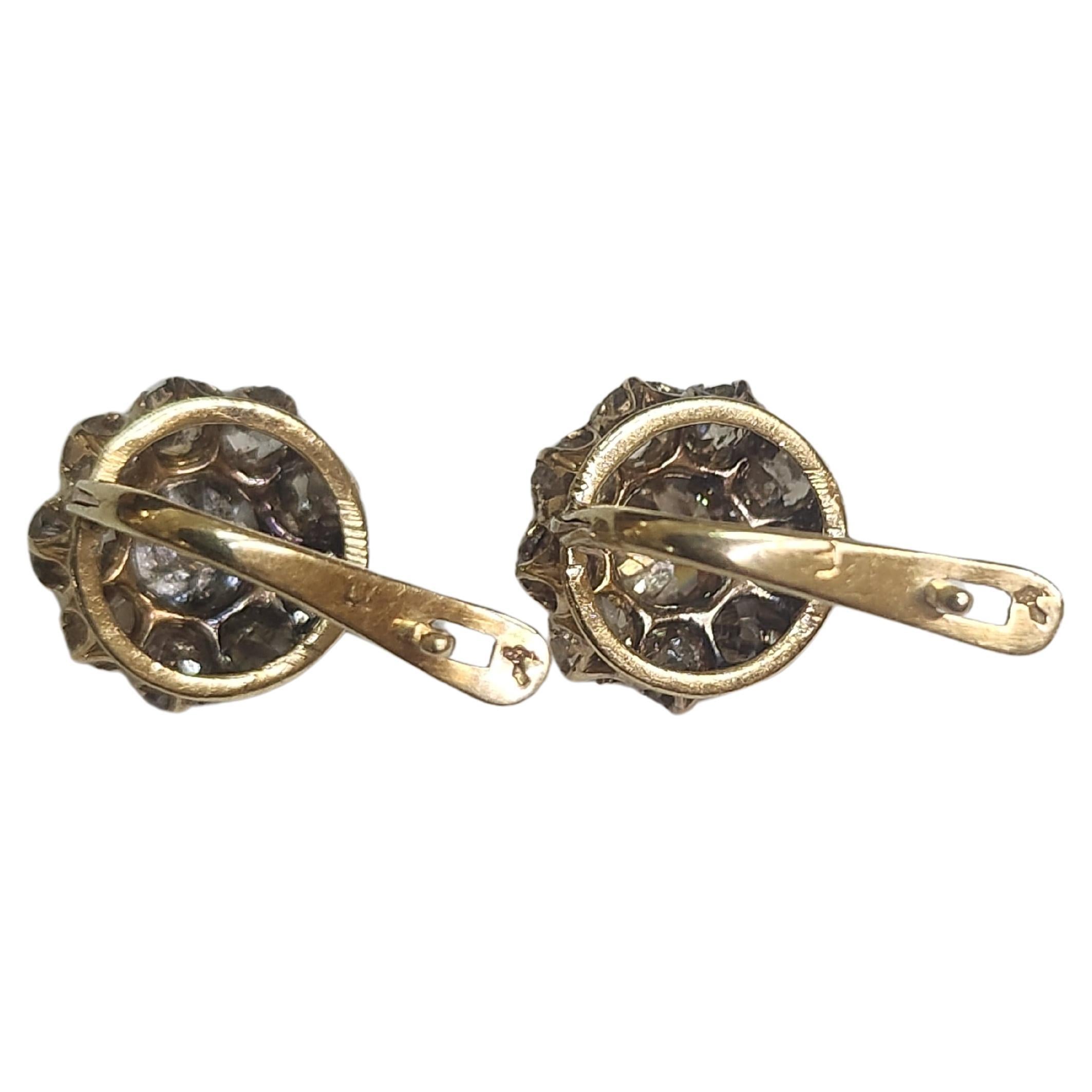 Antique old mine cut diamond earrings with an estimate weight 1.3 carats si clearity inclosions included excellent spark in 18k gold setting 