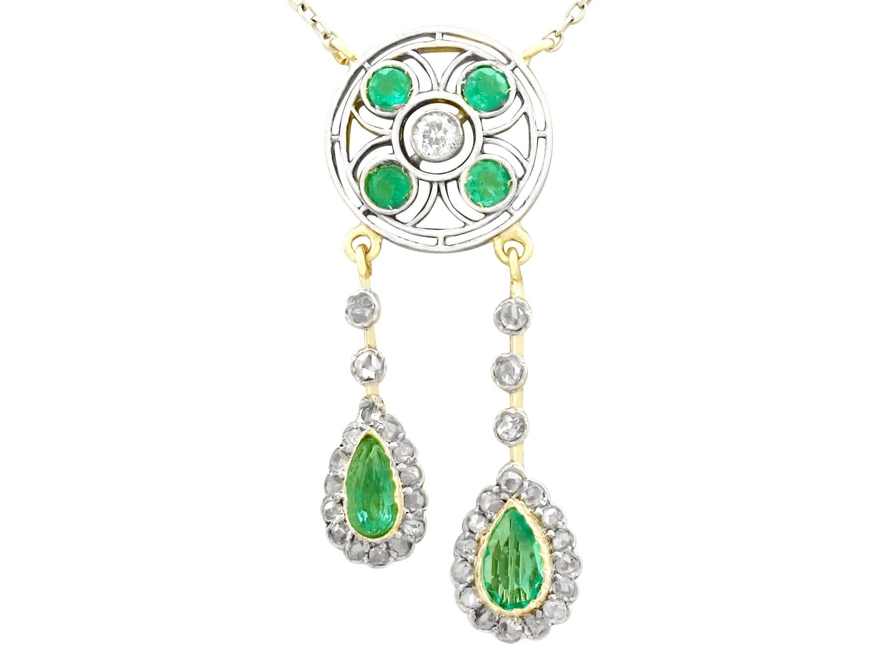 An impressive antique 1.32 carat emerald and 0.51 carat diamond, 15k yellow gold and palladium, platinum necklace; part of our diverse antique jewelry and estate jewelry collections.

This fine and impressive antique emerald pendant has been crafted