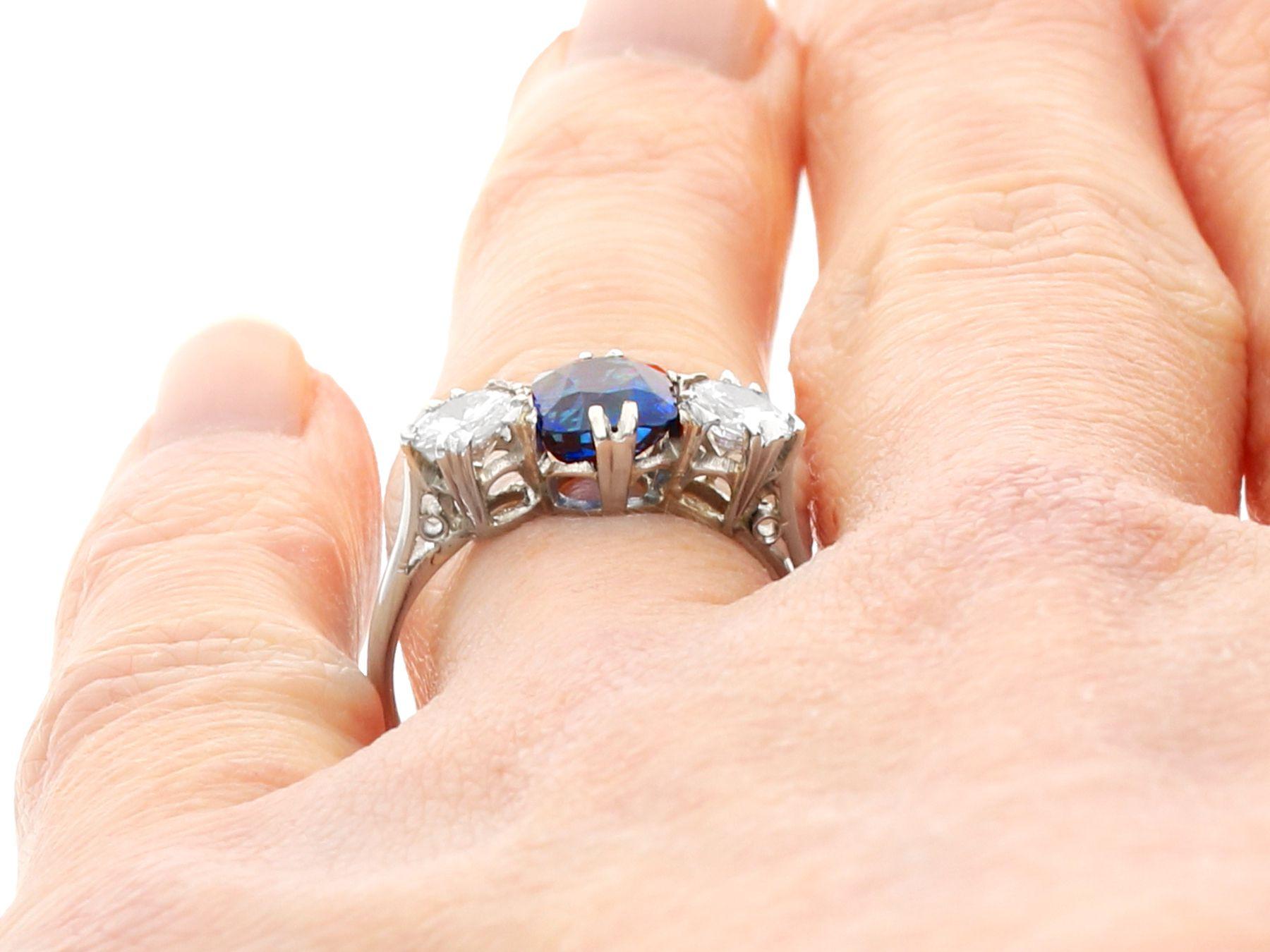 Antique 1.33 Ct Basaltic Sapphire and 0.88 Ct Diamond Platinum Trilogy Ring For Sale 7