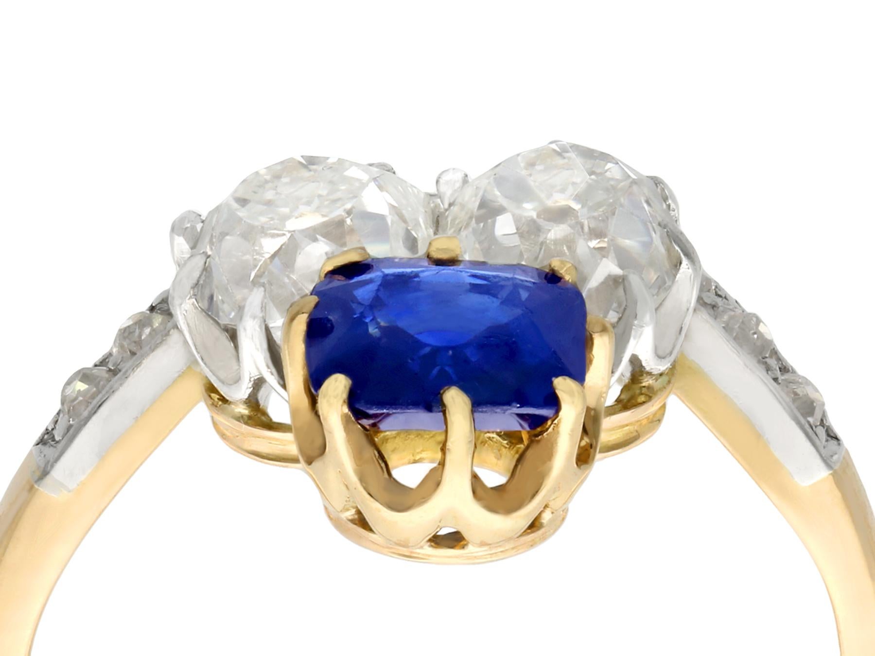 A stunning and impressive antique 1.35 carat Basaltic sapphire and 2.06 carat diamond, 18 karat yellow gold and platinum set cocktail ring; part of our antique jewelry collections

A stunning and impressive antique 1.35Ct blue sapphire and 2.06Ct