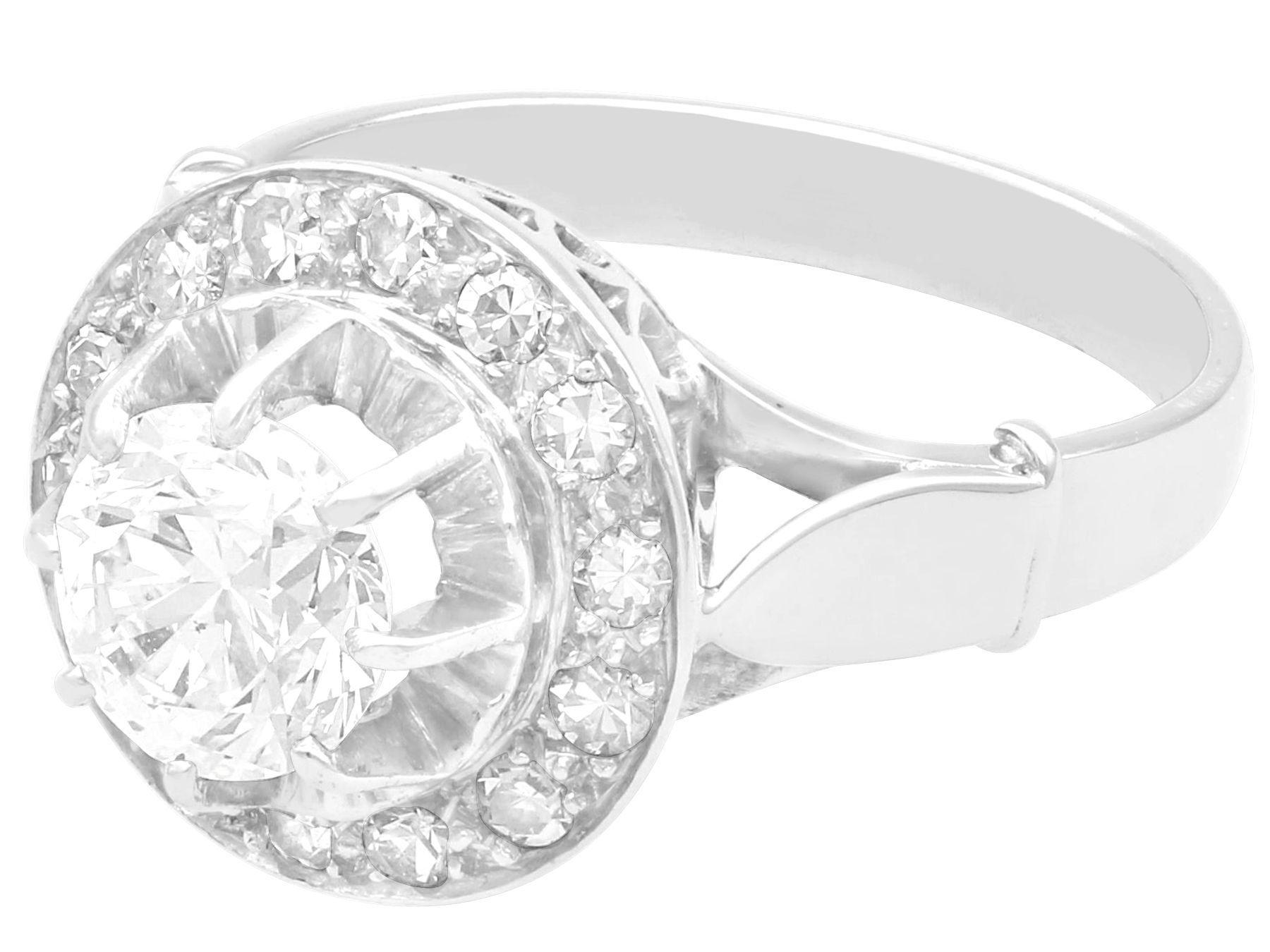 A stunning, fine and impressive antique 1.36 carat diamond, 18 karat white gold ring with platinum settings; part of our diverse diamond cocktail ring collections.

This stunning, fine and impressive diamond cluster ring has been crafted in 18k