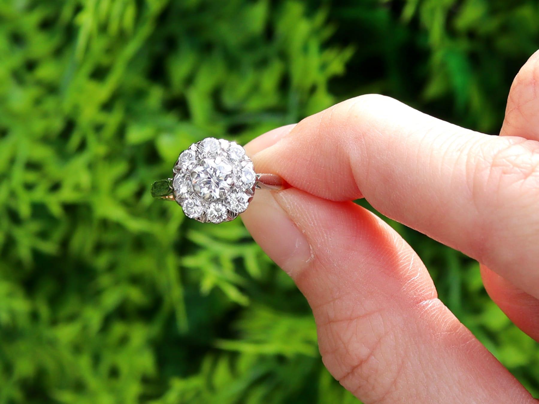 A stunning, fine and impressive 1.38 carat diamond, 18 karat yellow gold and platinum set cluster ring; part of our diverse collection of Edwardian engagement rings.

This stunning, fine and impressive antique diamond cluster ring has been crafted