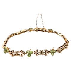Bracciale antico in oro rosa 13ct con gemme di peridoto