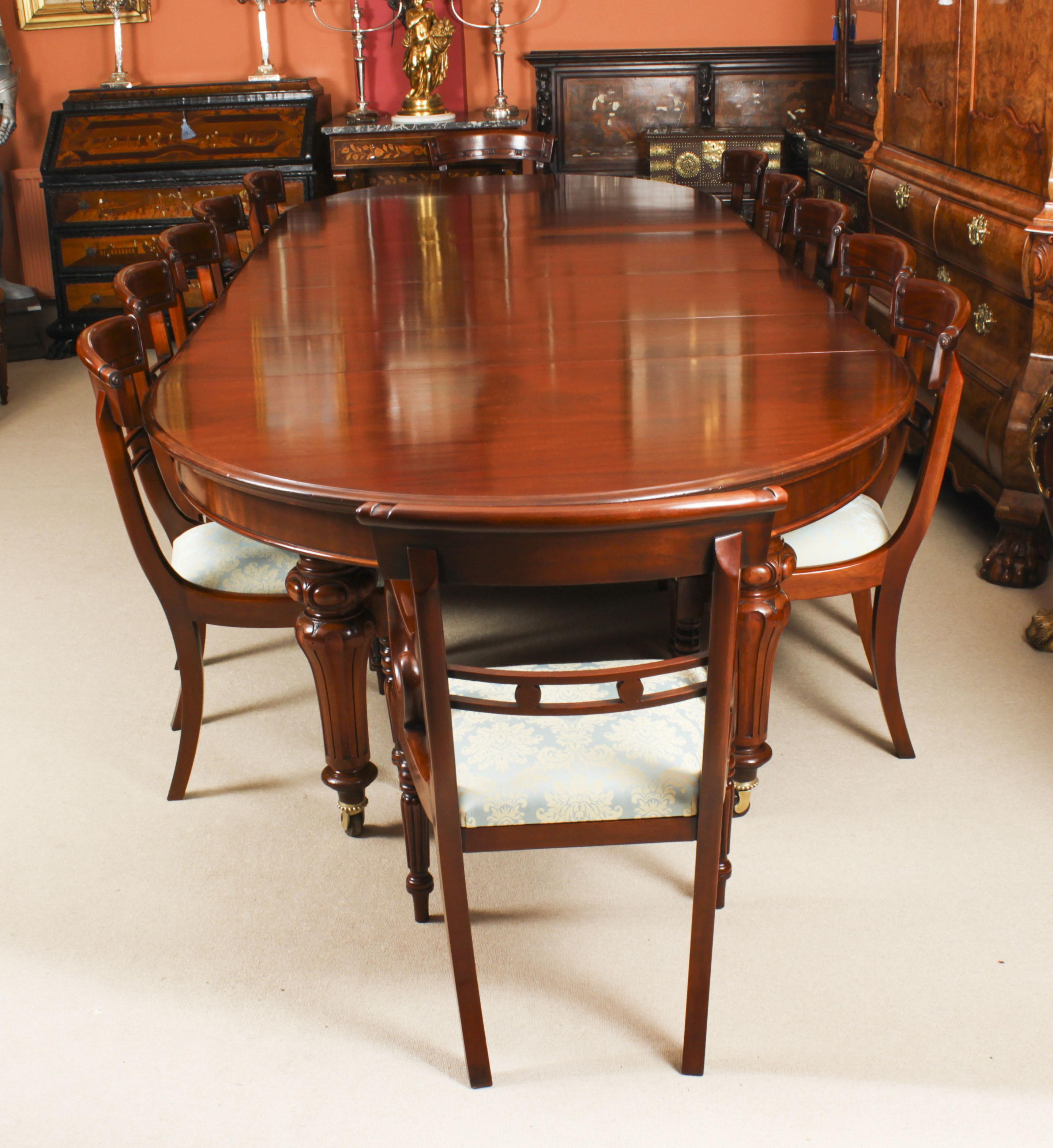 This is a fabulous large antique William IV oval ended flame mahogany extending dining table, circa 1830 in date. 
 
The table has four original leaves, can comfortably seat twelve and has been hand-crafted from flame mahogany which has a beautiful