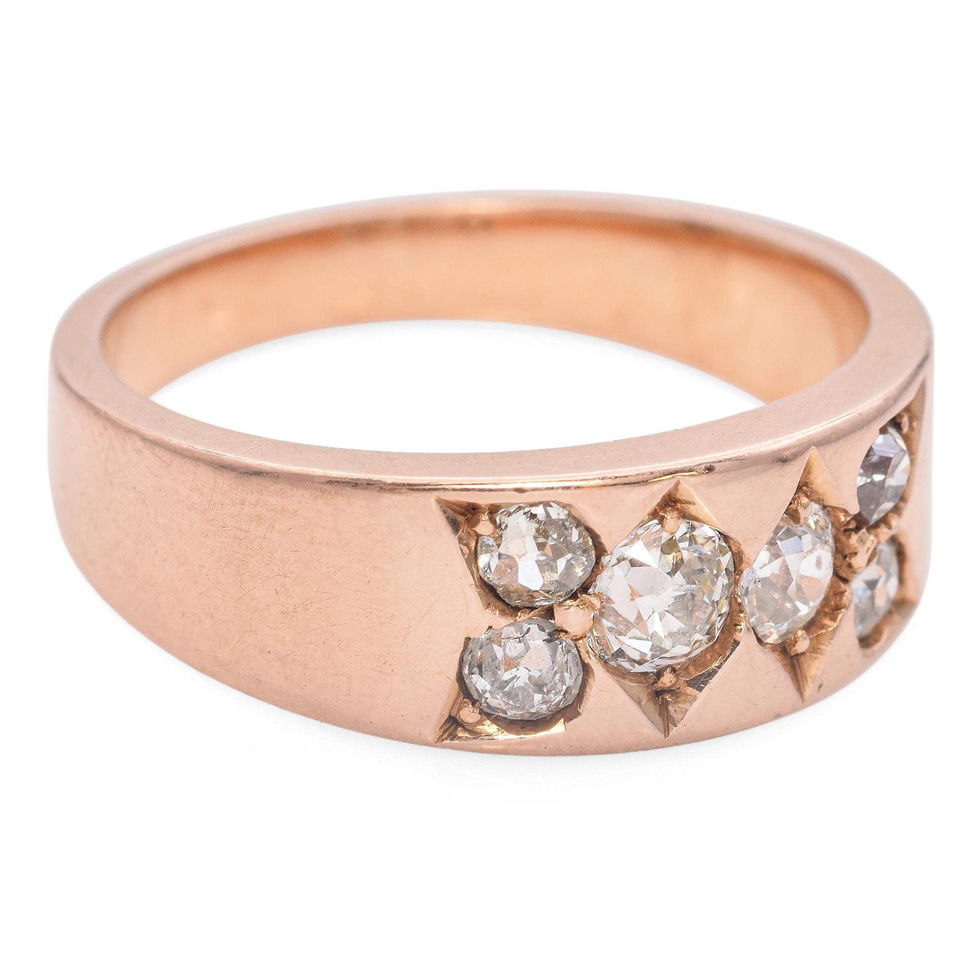 This unique six diamond band, set in luxurious rose gold, features a total of 0.49 carats of old mine cut diamonds. The diamonds are set in a wide tapered band, showcasing a harmonious blend of simplicity and sophistication.

Weight: 5.4