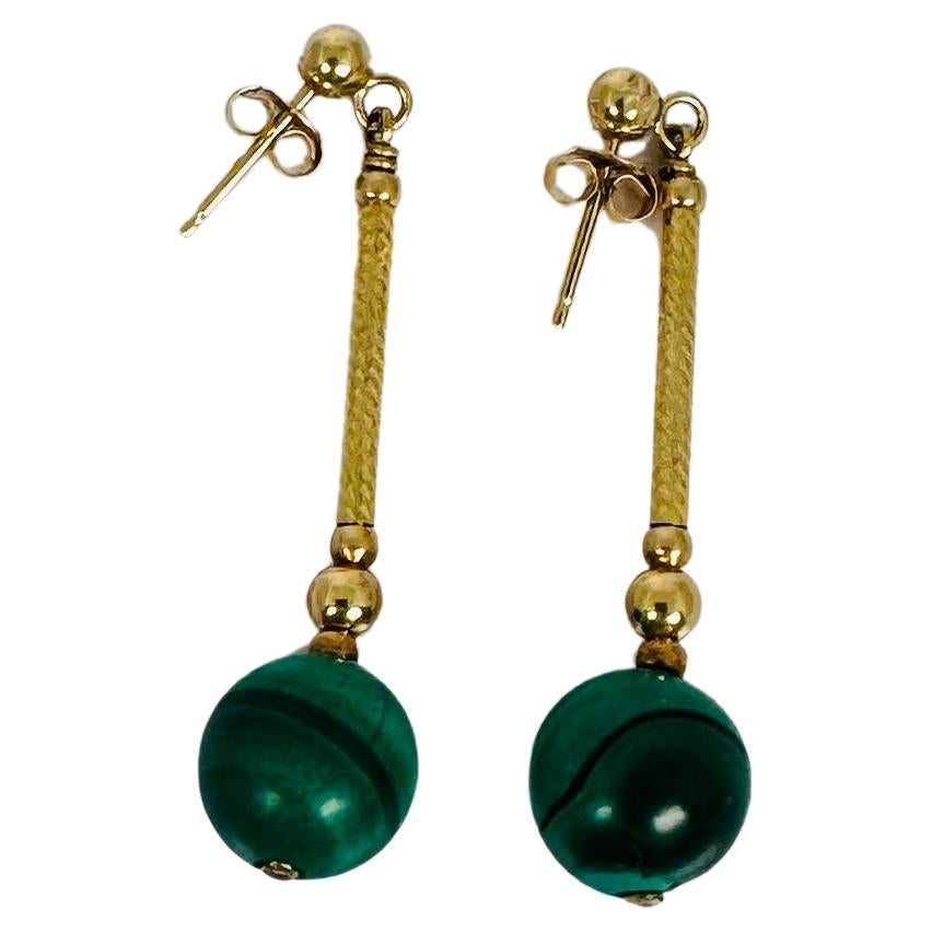 Antique 14 carat gold earrings with green macalite bols For Sale