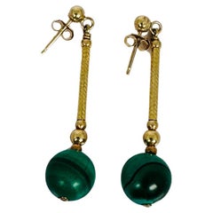 Antique 14 carat gold earrings with green macalite bols
